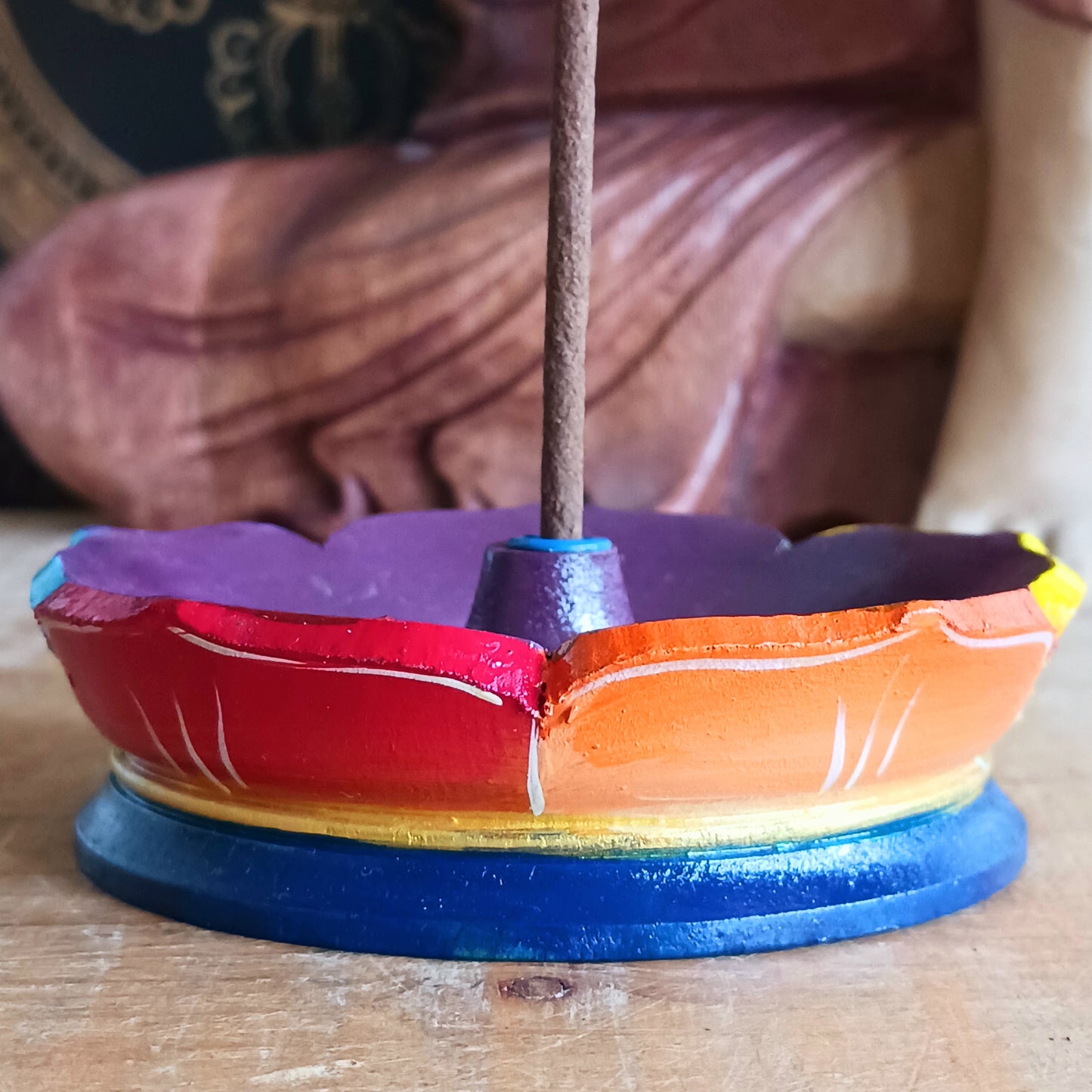 Add a touch of serenity and traditional Himalayan craftsmanship to your sacred space with this hand-painted Tibetan Incense Stick Holder. Carefully crafted in Nepal by skilled artisans, each wooden holder is decorated with a vibrant Seven Chakra lotus design, symbolizing balance, energy, and harmony.