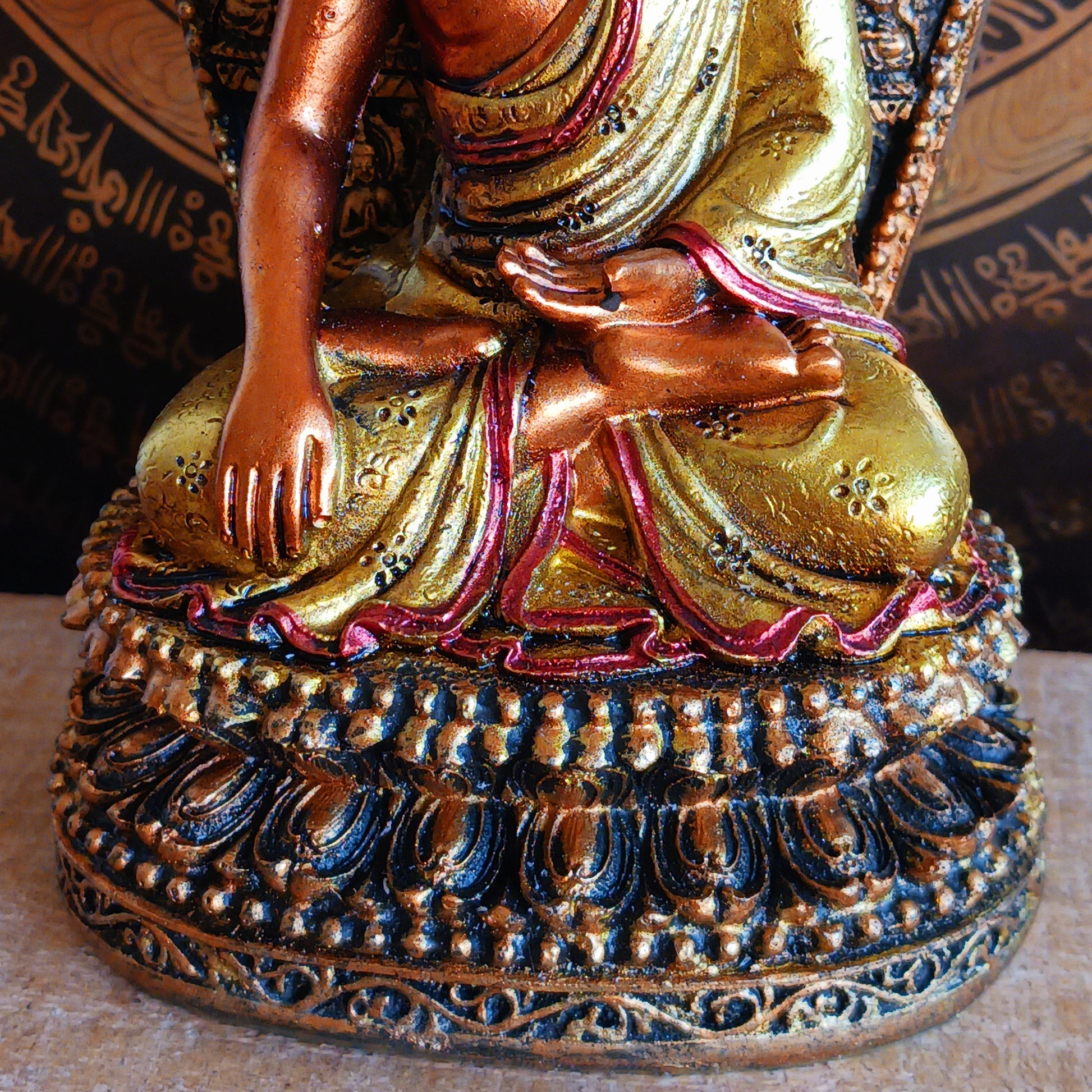 This finely detailed statue depicts the Historical Buddha Shakyamuni in the revered Bhumisparsha Mudra, the iconic earth-touching hand gesture symbolizing the moment of enlightenment.