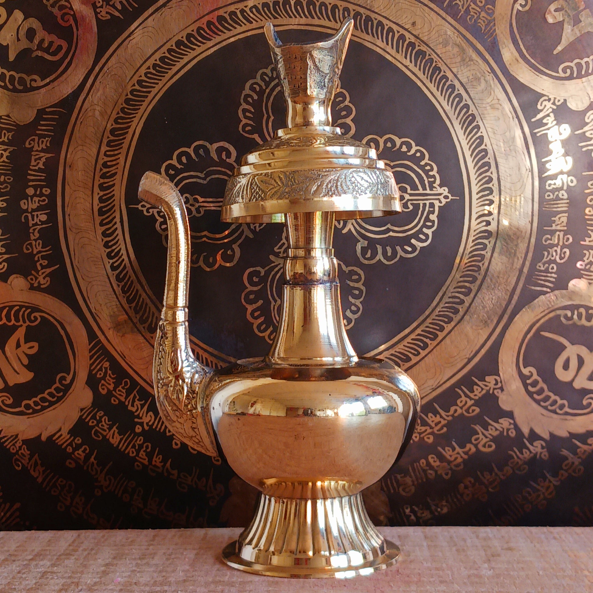 Immerse your spiritual practice in the profound tradition of Tibetan Buddhism with this authentic Tibetan Bhumpa Ritual Water Vessel. Revered as a sacred container for blessed water, the bhumpa plays a central role in purification rites such as Trusol, where negative energies are dispelled and harmony is restored.