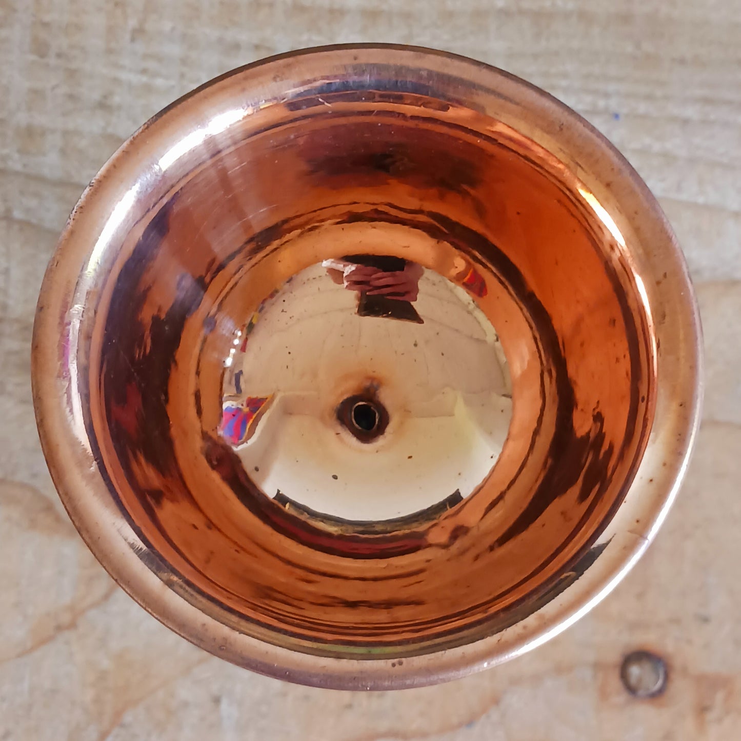 Illuminate your spiritual practice with this fine Traditional Tibetan Butter Lamp, handcrafted from high-quality copper and adorned with intricate Auspicious Symbols. These sacred lamps are a central element in Tibetan Buddhist rituals, symbolizing the light of wisdom dispelling the darkness of ignorance. Commonly found in Himalayan temples and monasteries, butter lamps are offered each morning by Tibetan Buddhists.