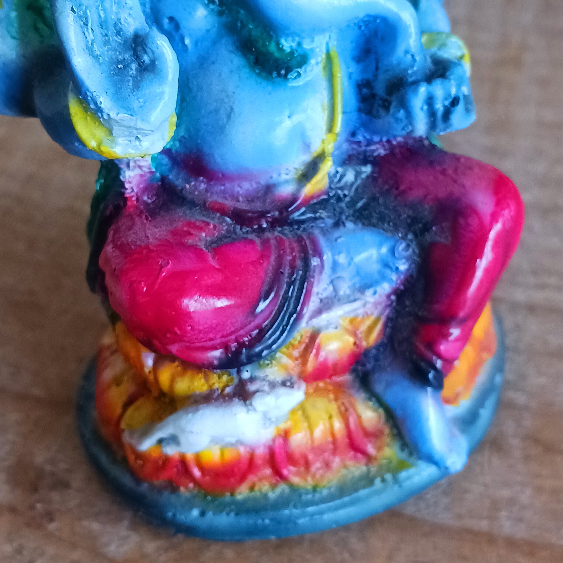 Bring a touch of divine energy and cultural beauty into your home with this 11.5cm Lord Ganesha statue, expertly crafted from high-quality resin. Each figurine is hand-painted in vibrant, eye-catching colours, capturing the warm, uplifting presence of the beloved elephant-headed deity.