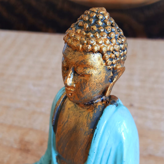 Create a calming and uplifting atmosphere with this beautiful little Turquoise & Gold Buddha Statue. Designed to inspire peace, harmony, and positive energy, this charming decorative ornament makes a wonderful addition to any home, office, meditation room, or yoga space.