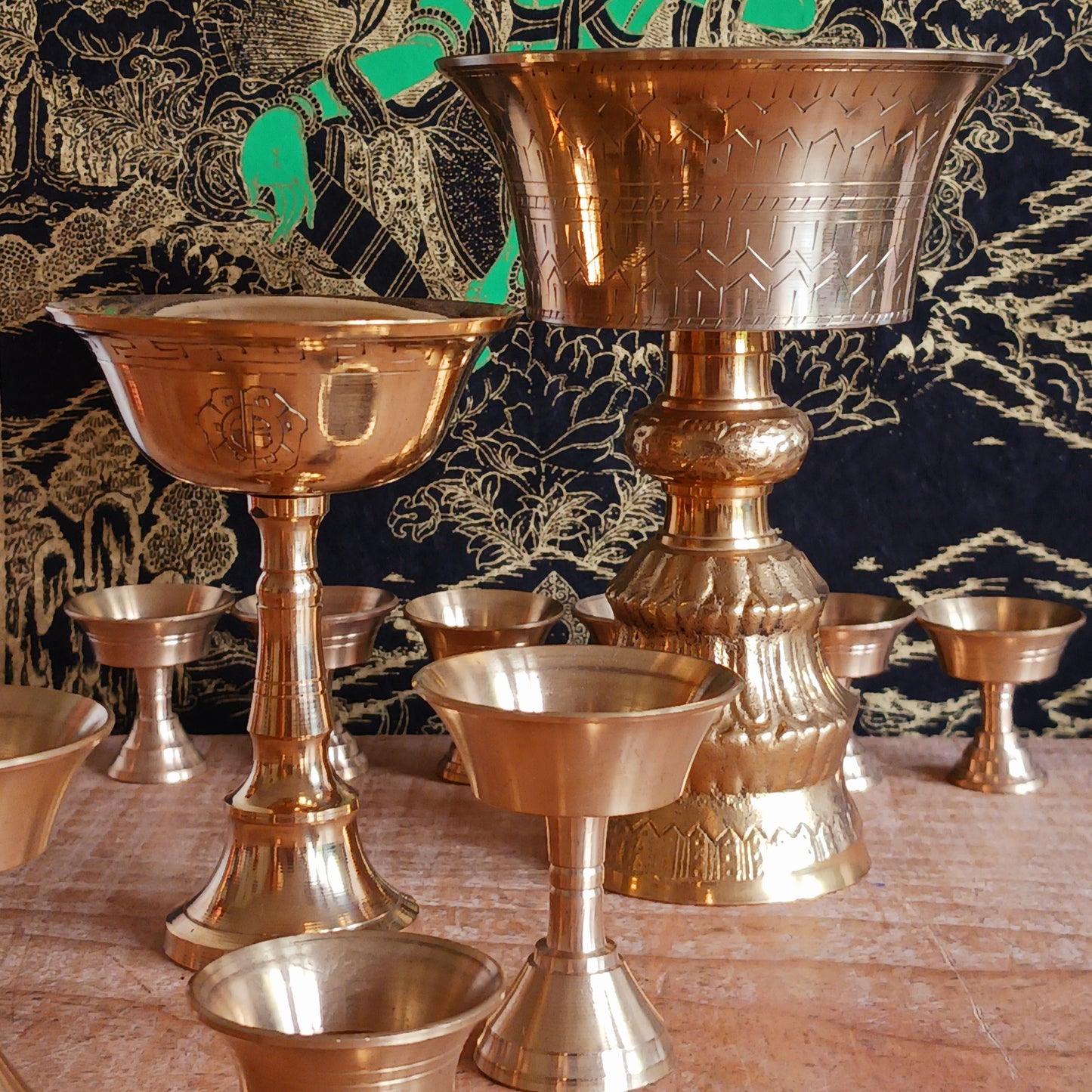 Made from durable brass, the butter lamp emits a warm, soothing glow—ideal for enhancing meditation, prayer, or altar settings. Its two-piece design features a convenient screw mechanism, making it easy to clean and store. A symbol of devotion and cultural heritage, this lamp adds authenticity and serenity to any spiritual practice.