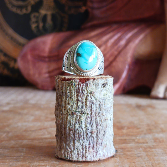 This beautiful decorative Tibetan turquoise ring is carefully handcrafted with genuine Sterling Silver 925, featuring an intricate surround design that highlights the natural beauty of the stone.