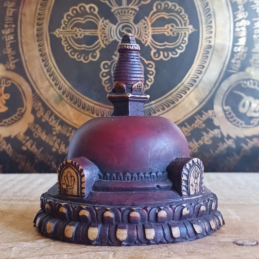 Bring the serenity of Buddhist tradition into your space with this simple Resin Boudhanath Stupa, beautifully fashioned as a commemorative monument. Traditionally, stupas serve as sacred structures that enshrine holy relics associated with the Buddha or revered spiritual figures.