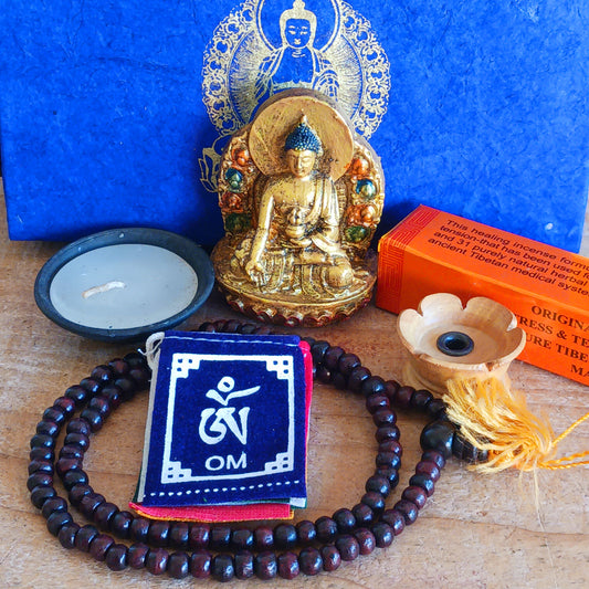 Elevate your meditation and Puja practice wherever your journey takes you. This Handmade Nepalese Buddhist Travelling Altar Set provides a complete, compact sacred space for spiritual grounding on the road or away from home.