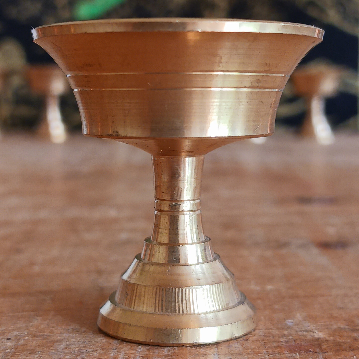 Bring sacred Tibetan tradition into your space with this handcrafted Brass Butter Lamp, a timeless symbol of wisdom and spiritual illumination. Commonly found in Tibetan Buddhist temples and monasteries across the Himalayas, butter lamps are offered each morning to dispel darkness and invite enlightenment.