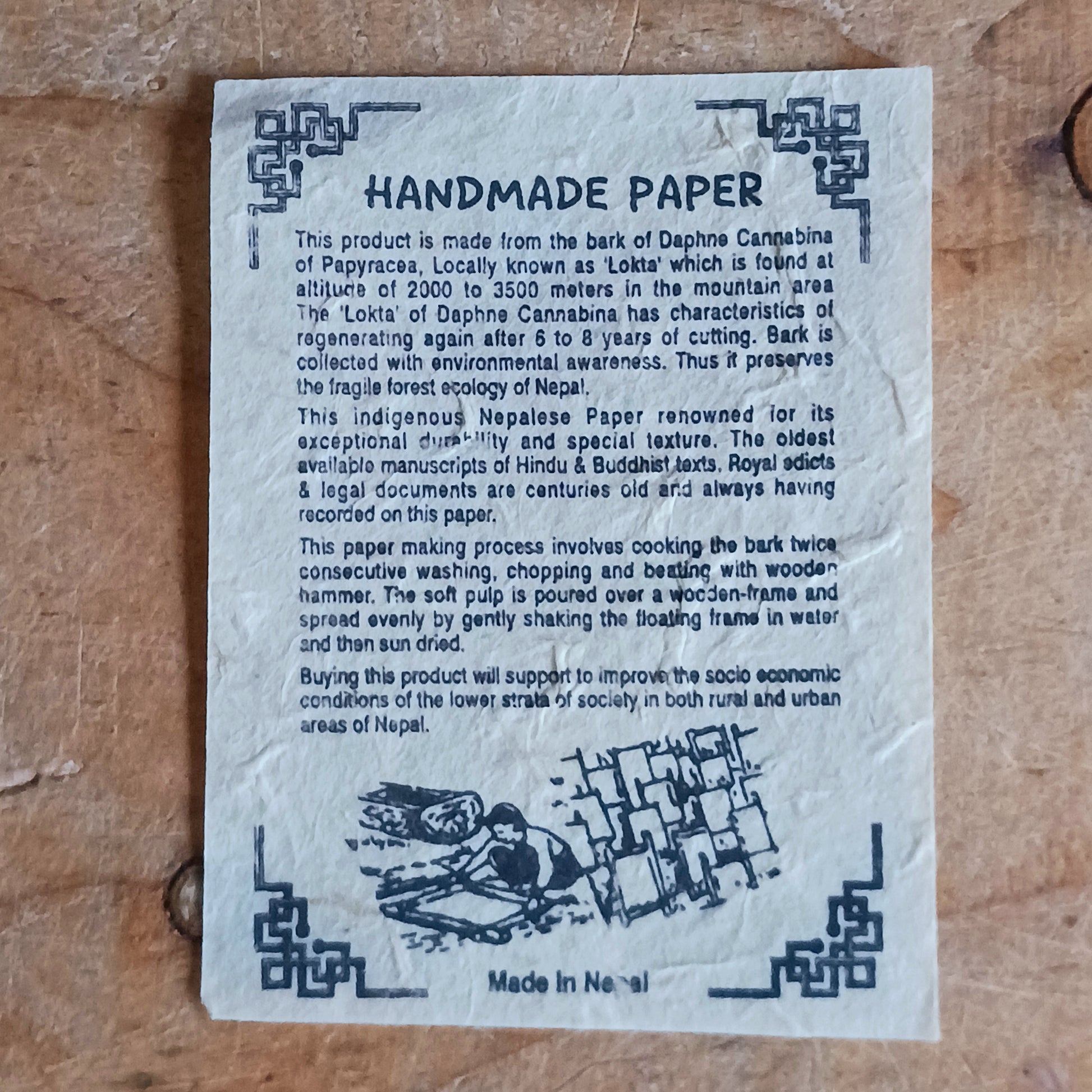 Experience the beauty of traditional Nepalese craftsmanship with this Buddha | Wisdom Eyes Notebook, handcrafted from natural Lokta paper. Each notebook features a durable hardback cover and approximately 50 pages of acid-free, eco-friendly Lokta paper, making it perfect for writing, sketching, journaling, or preserving important scripts for long periods.