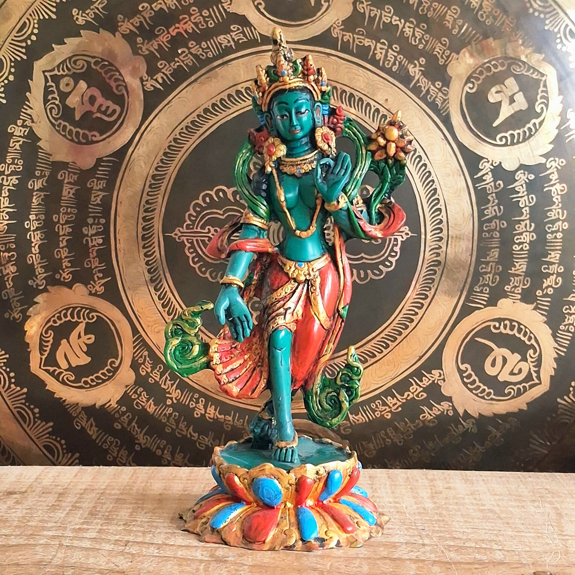 Bring sacred presence and compassionate energy into your space with this beautifully hand-painted resin statue of Green Tara, the revered bodhisattva of compassion and wisdom. One of the 21 manifestations of Tara, she is depicted here standing gracefully with her hands in the varada mudra, the gesture of generosity and blessing.