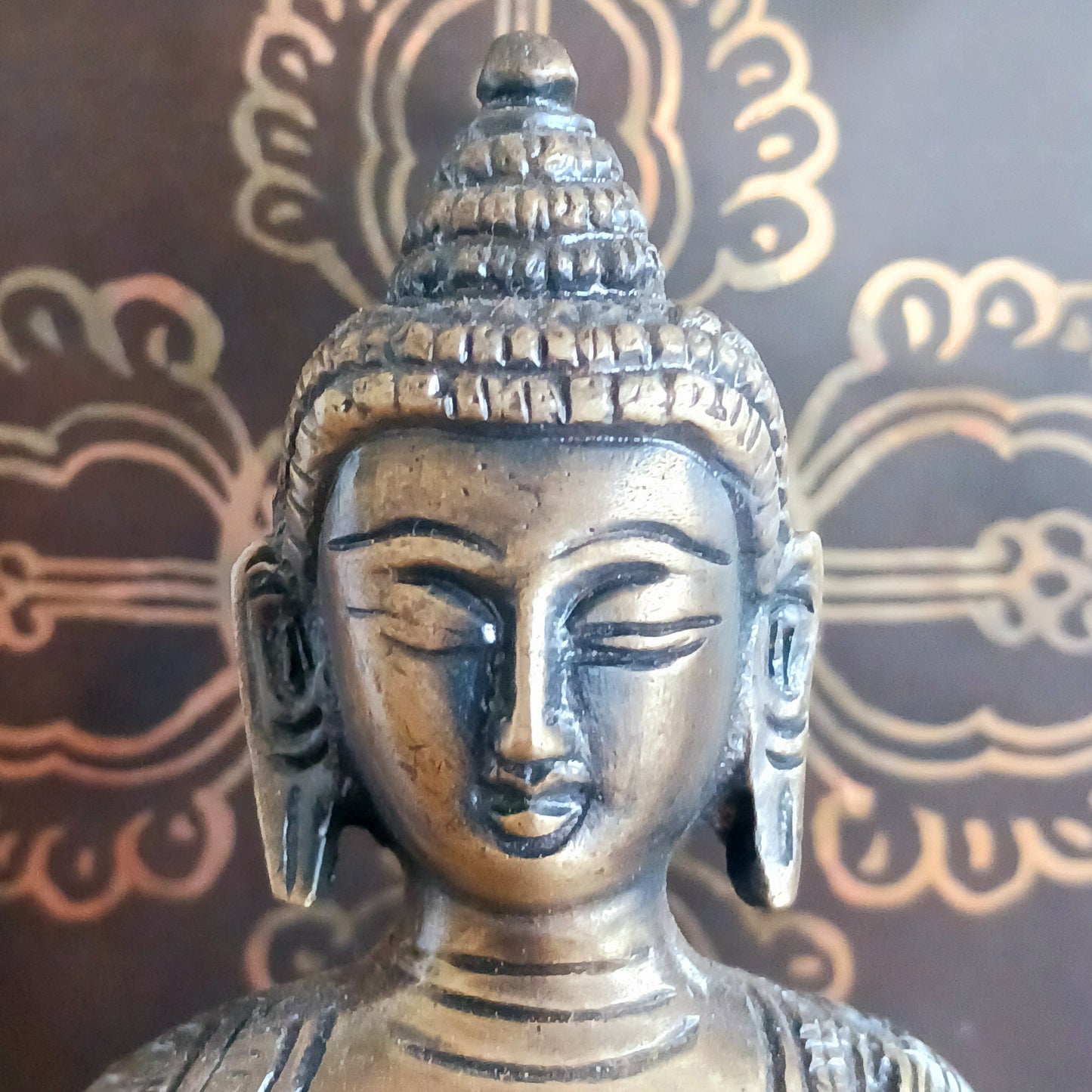 Elevate your spiritual space with this exquisite Akshobya Buddha statue, expertly cast in heavy brass and engraved with intricate detail. Representing one of the five Dhyani Buddhas, Akshobya is visualized in blue and associated with the heart chakra, symbolizing the transformation of anger and sadness into love and compassion.