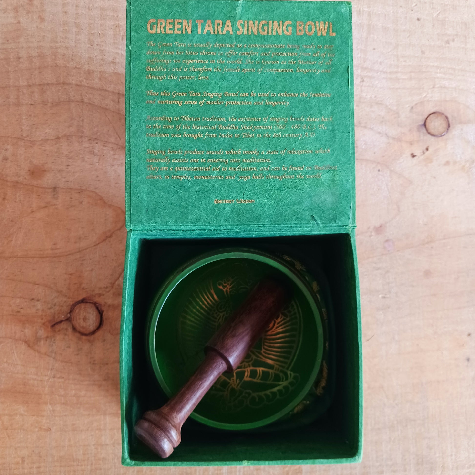 Hand-painted Green Tara singing bowl set with striker & pillow. A sacred gift for meditation, mindfulness, or yoga. Comes in eco-friendly packaging.