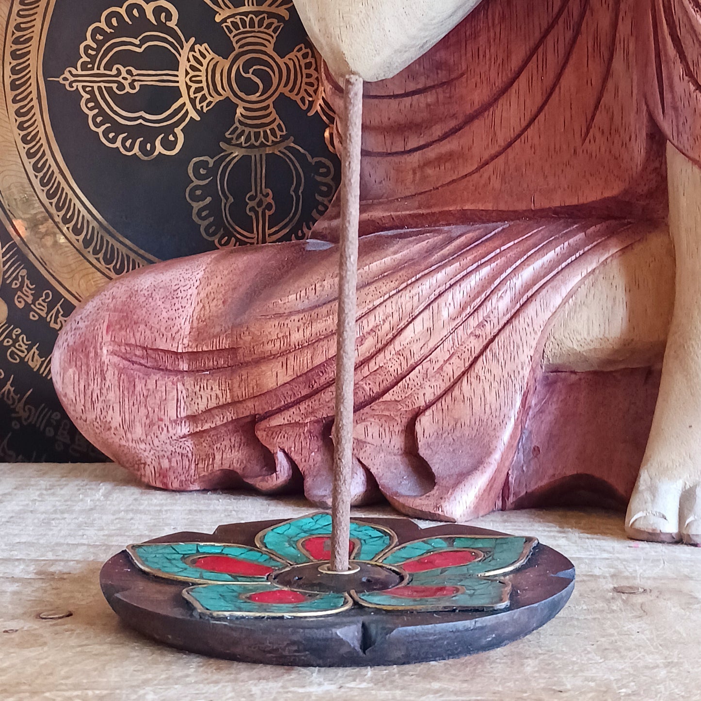 Elevate your incense rituals with these beautifully handcrafted wooden incense burners featuring intricate stone inlay designs. Each piece is made by skilled artisans, giving every burner a unique character—small imperfections are natural and celebrated as part of its handmade charm.