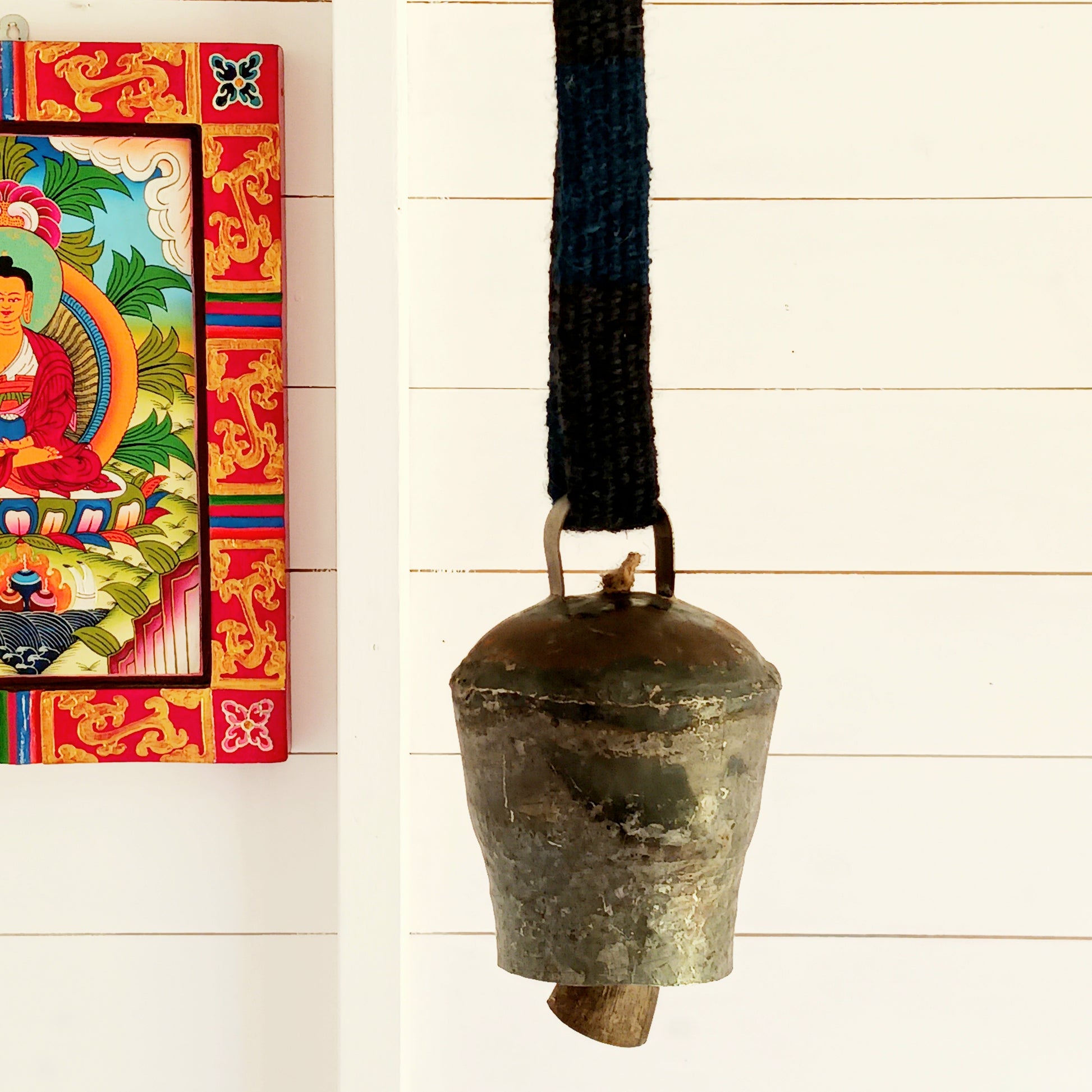 Bring the authentic charm of the Himalayas into your home with this handcrafted Nepalese Yak Bell. Traditionally used by yak herders in Nepal and Tibet, these distinctive bells were hung around the necks of yaks to help locate animals grazing across mountainous landscapes.