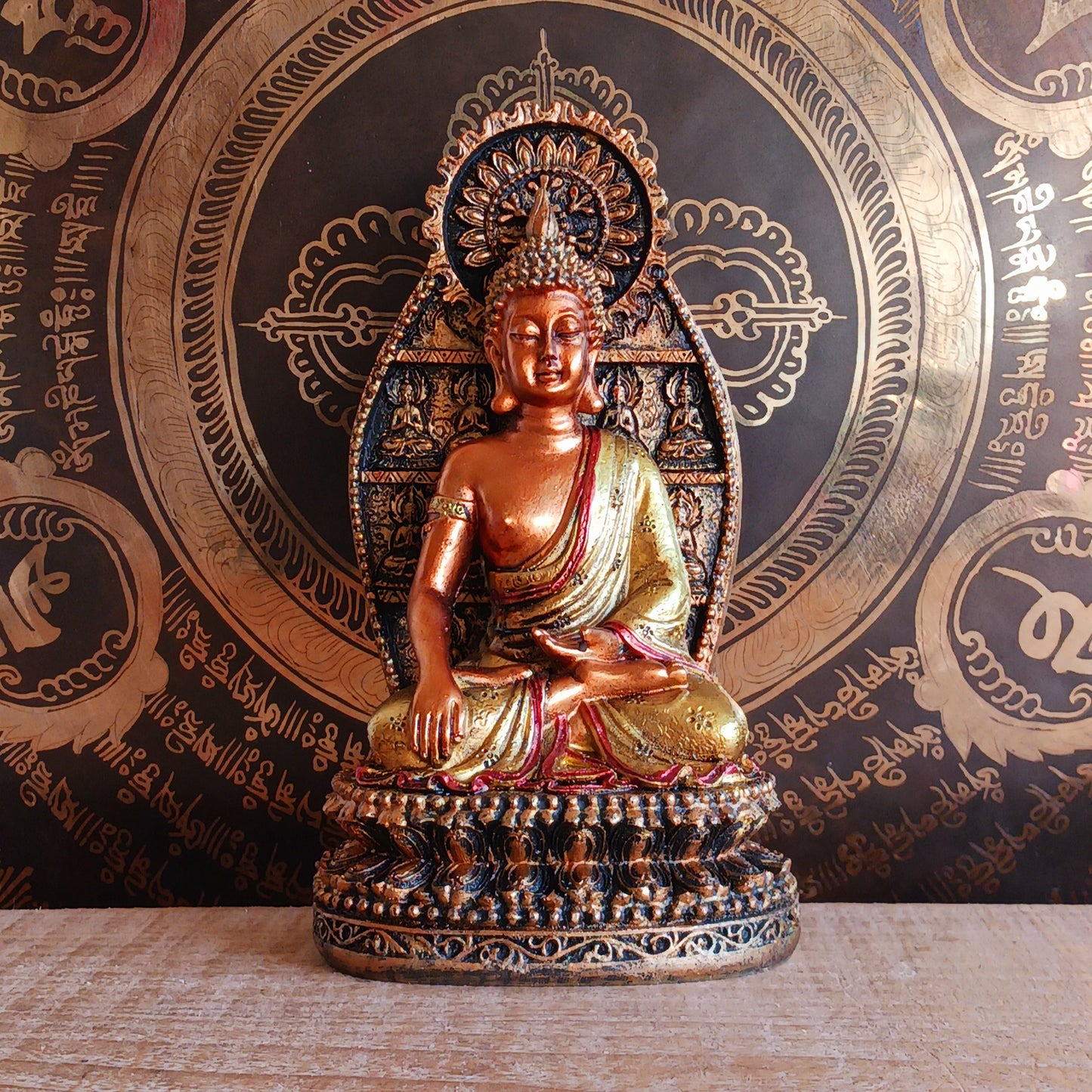 This finely detailed statue depicts the Historical Buddha Shakyamuni in the revered Bhumisparsha Mudra, the iconic earth-touching hand gesture symbolizing the moment of enlightenment.