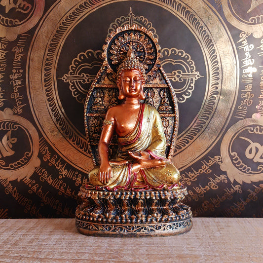 This finely detailed statue depicts the Historical Buddha Shakyamuni in the revered Bhumisparsha Mudra, the iconic earth-touching hand gesture symbolizing the moment of enlightenment.