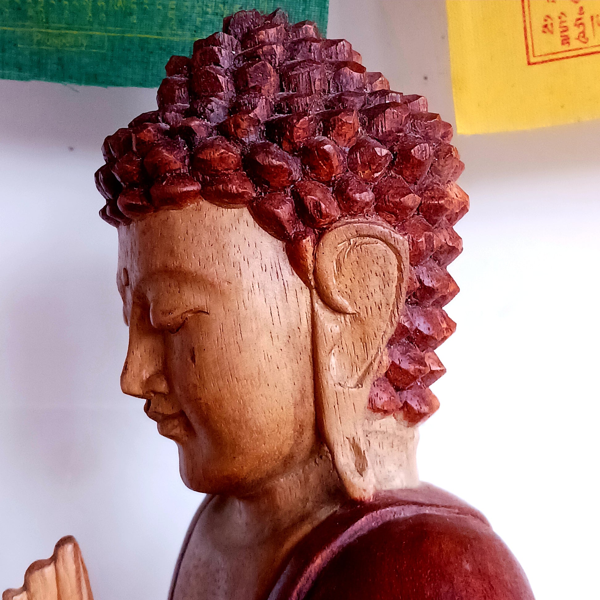 Bring calm, wisdom, and mindful intention into your space with this beautifully serene Teaching Buddha statue, hand-carved from sustainable Suar wood (Albizia Saman), a fast-growing and responsibly cultivated hardwood.