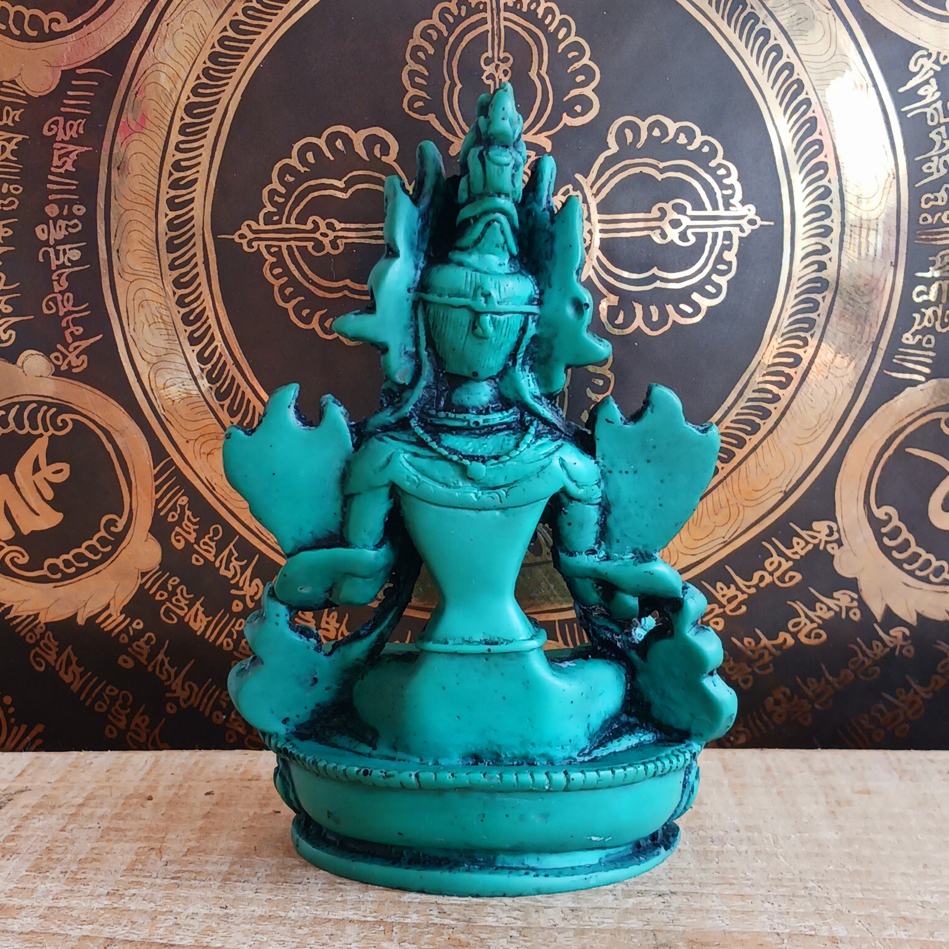 Bold green resin Green Tara statue with symbolic mudras. A powerful spiritual accent for home, altar, or gift.