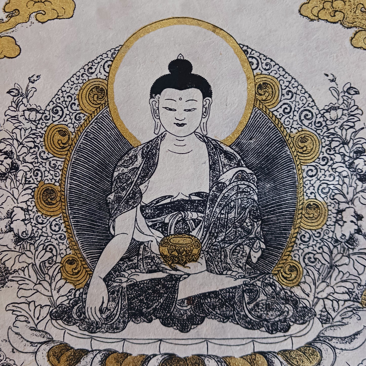 Bring the beauty, wisdom, and serenity of Buddhist art into your home with this handmade Lokta paper wall calendar, featuring seven revered Buddhist deities illustrated in traditional Thangka style. Each page showcases one of the following sacred figures: