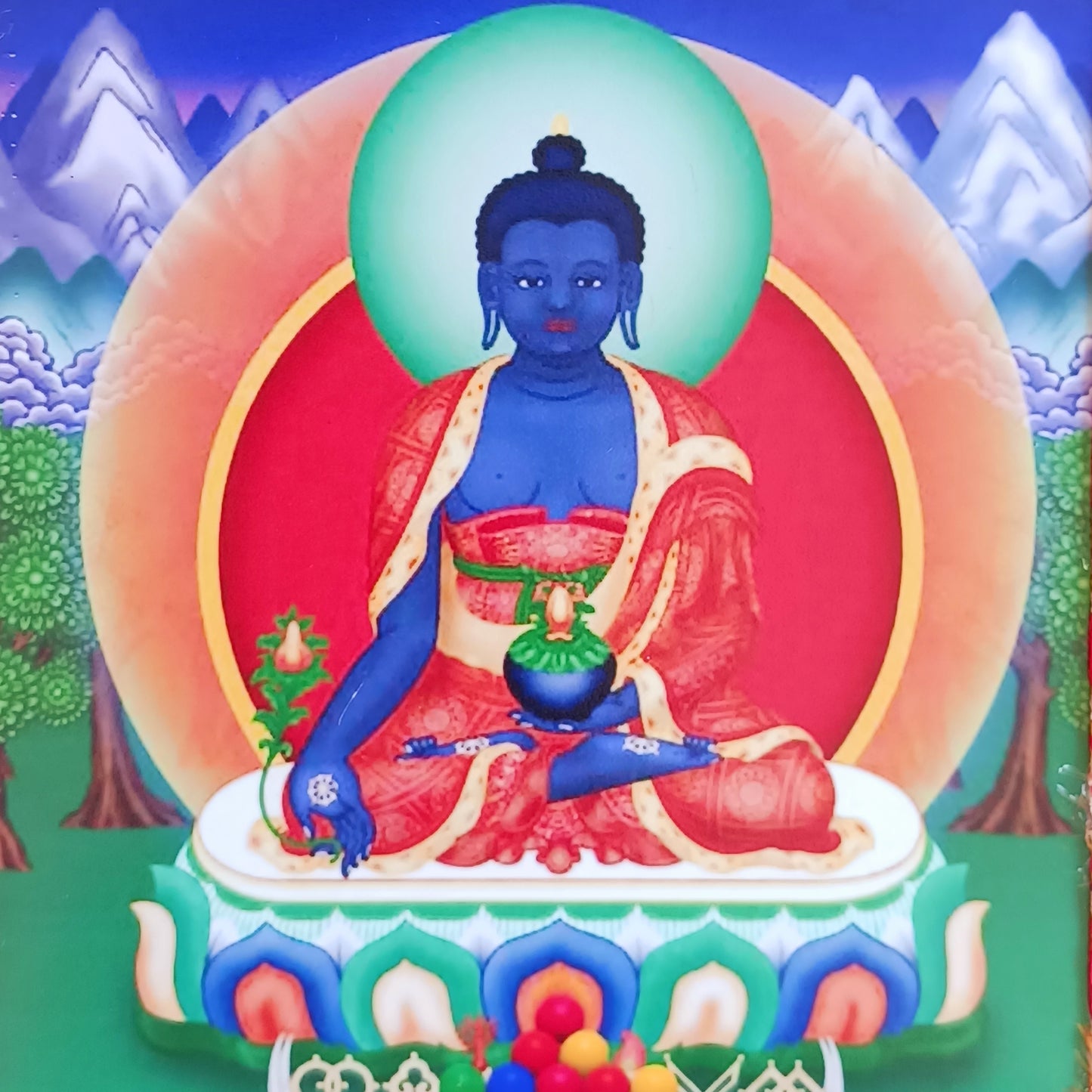 Bring healing energy, restoration, and spiritual harmony into your home with this beautiful Medicine Buddha Traditional Printed Thangka, elegantly presented in a handmade brocade frame.