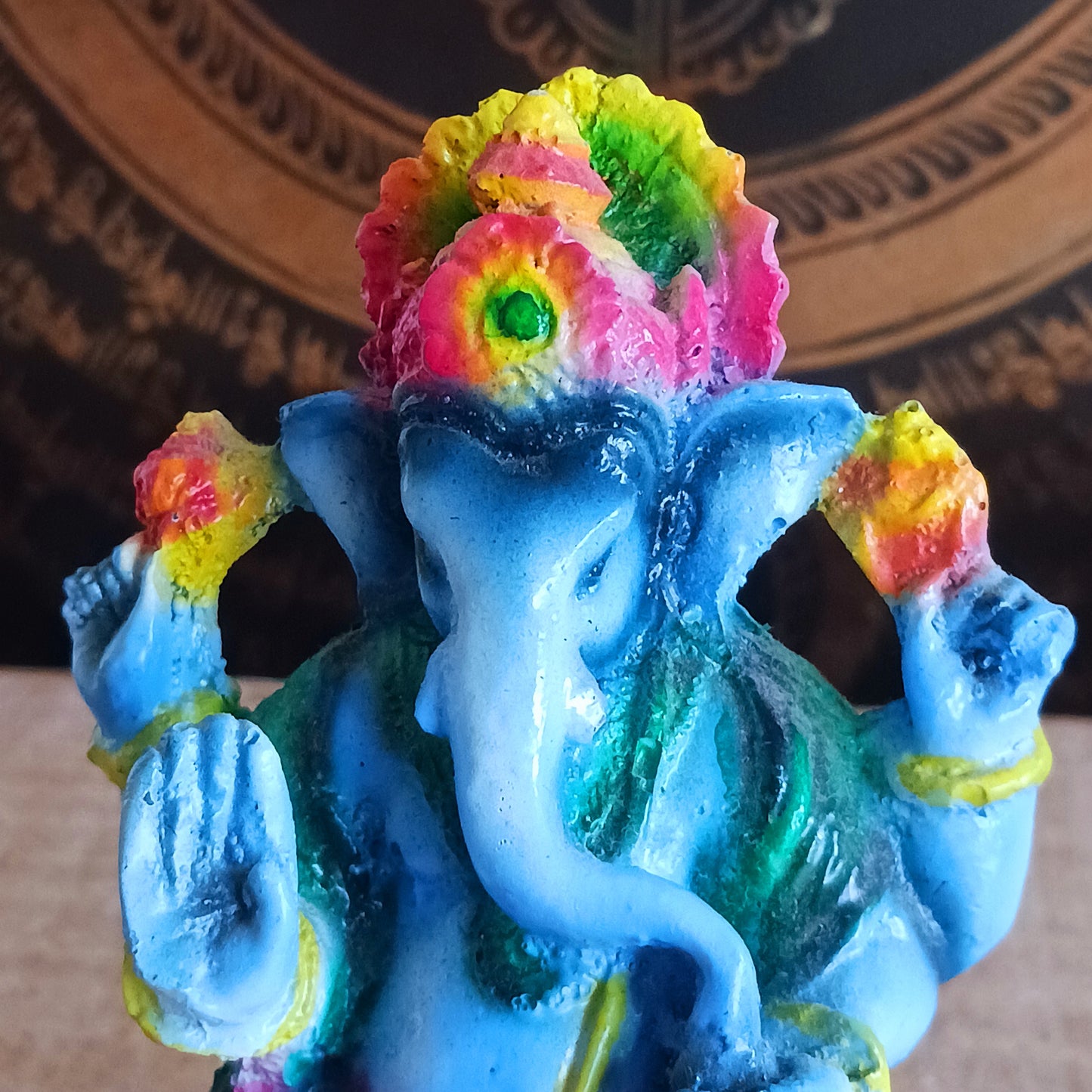 Bring a touch of divine energy and cultural beauty into your home with this 11.5cm Lord Ganesha statue, expertly crafted from high-quality resin. Each figurine is hand-painted in vibrant, eye-catching colours, capturing the warm, uplifting presence of the beloved elephant-headed deity.
