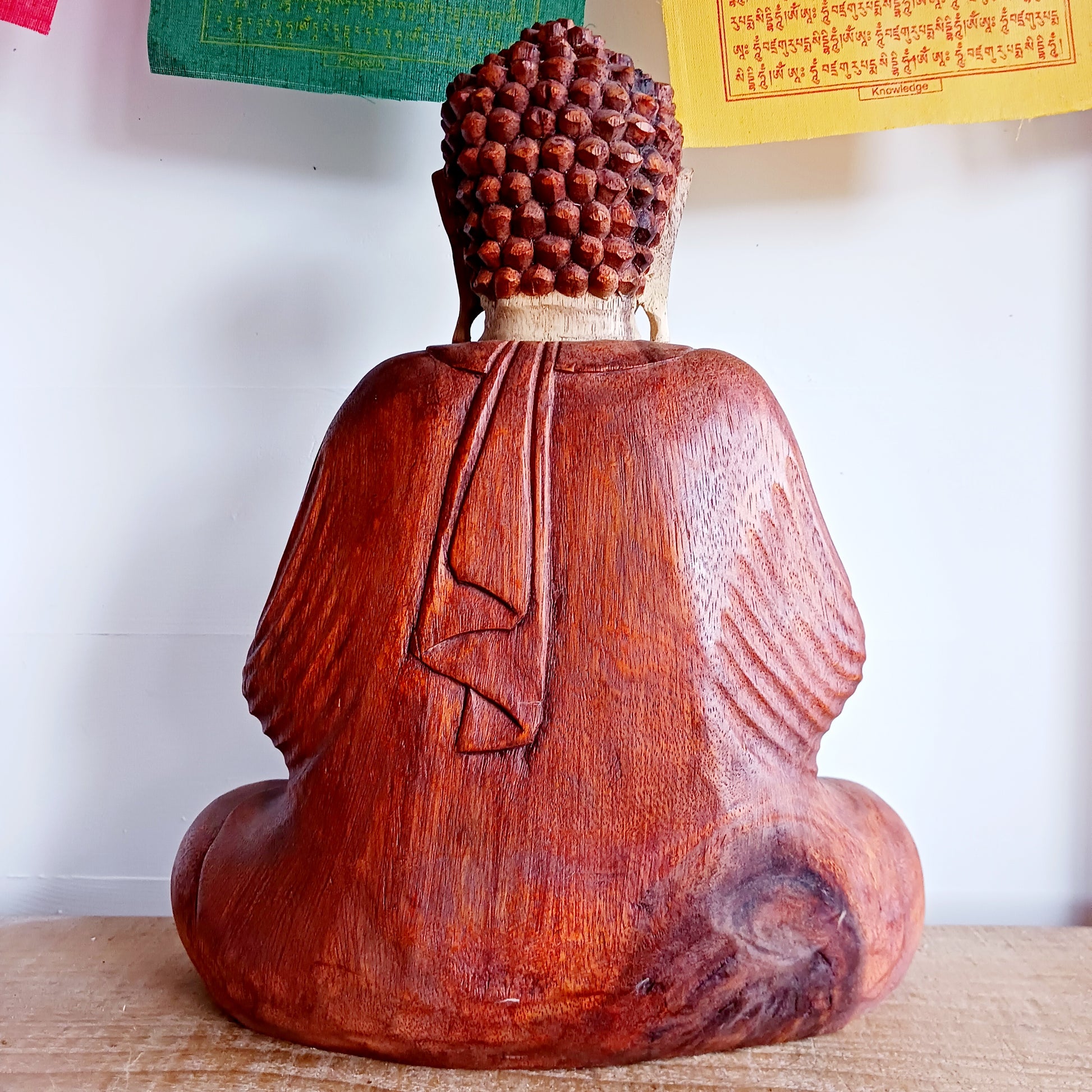 Bring calm, wisdom, and mindful intention into your space with this beautifully serene Teaching Buddha statue, hand-carved from sustainable Suar wood (Albizia Saman), a fast-growing and responsibly cultivated hardwood.