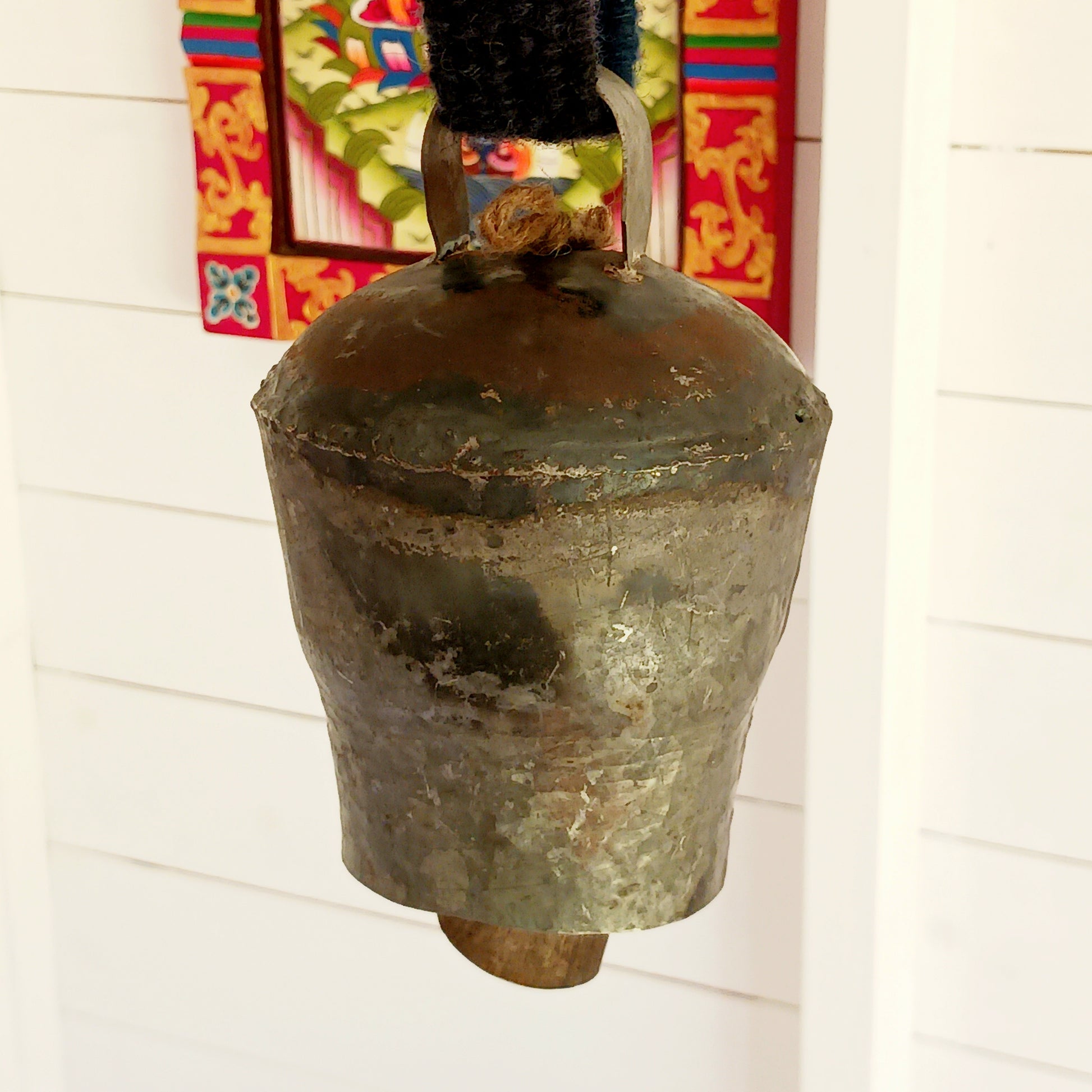 Bring the authentic charm of the Himalayas into your home with this handcrafted Nepalese Yak Bell. Traditionally used by yak herders in Nepal and Tibet, these distinctive bells were hung around the necks of yaks to help locate animals grazing across mountainous landscapes.