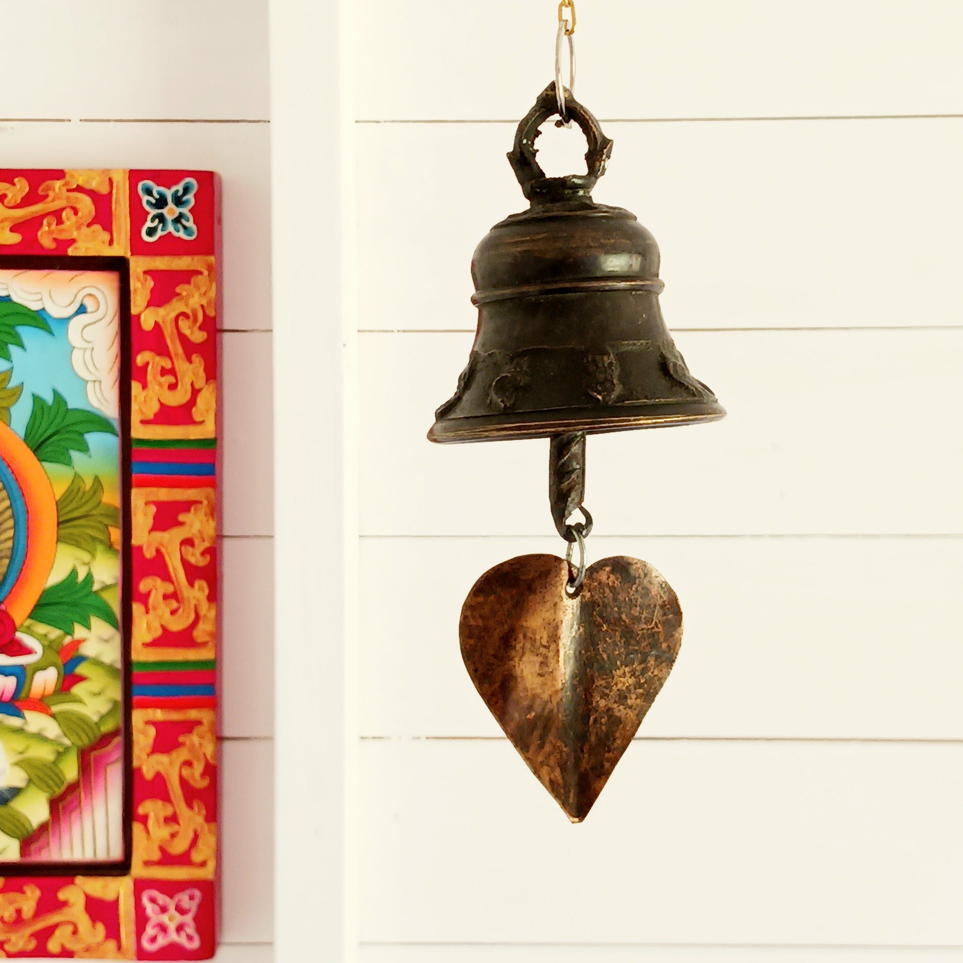 Bring a sense of peace and tradition to your home or garden with this beautifully handcrafted Brass Temple Hanging Bell with Bodhi Leaf. Made by skilled artisans in Nepal using traditional techniques, this elegant bell features a classic temple bell design paired with a decorative brass Bodhi leaf, a symbol of wisdom, enlightenment, and spiritual growth.