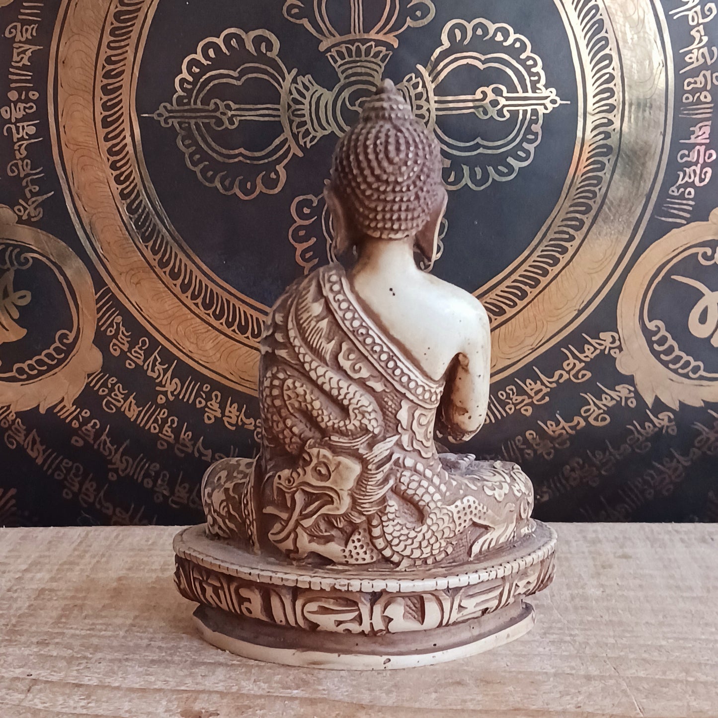 Bring serenity and protection into your space with this exquisite Buddha Amogasiddhi statue. Handcrafted with intricate detailing, this statue represents one of the Five Dhyani Buddhas, embodying the Wisdom of Unfailing Accomplishment.