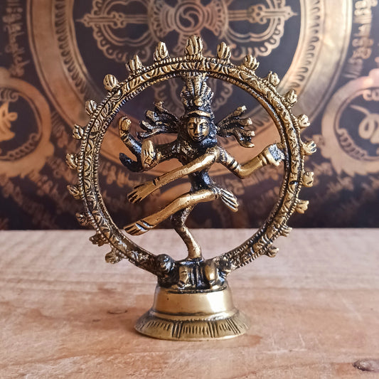 Invite balance, protection, and divine energy into your space with this little beautifully crafted&nbsp;Brass Shiva Nataraja Statue. Cast in solid brass, this small yet striking sculpture captures Shiva in his cosmic dance—Nataraja, the King of Dance—symbolizing the ever-moving universe and the eternal cycle of creation, destruction, and renewal.