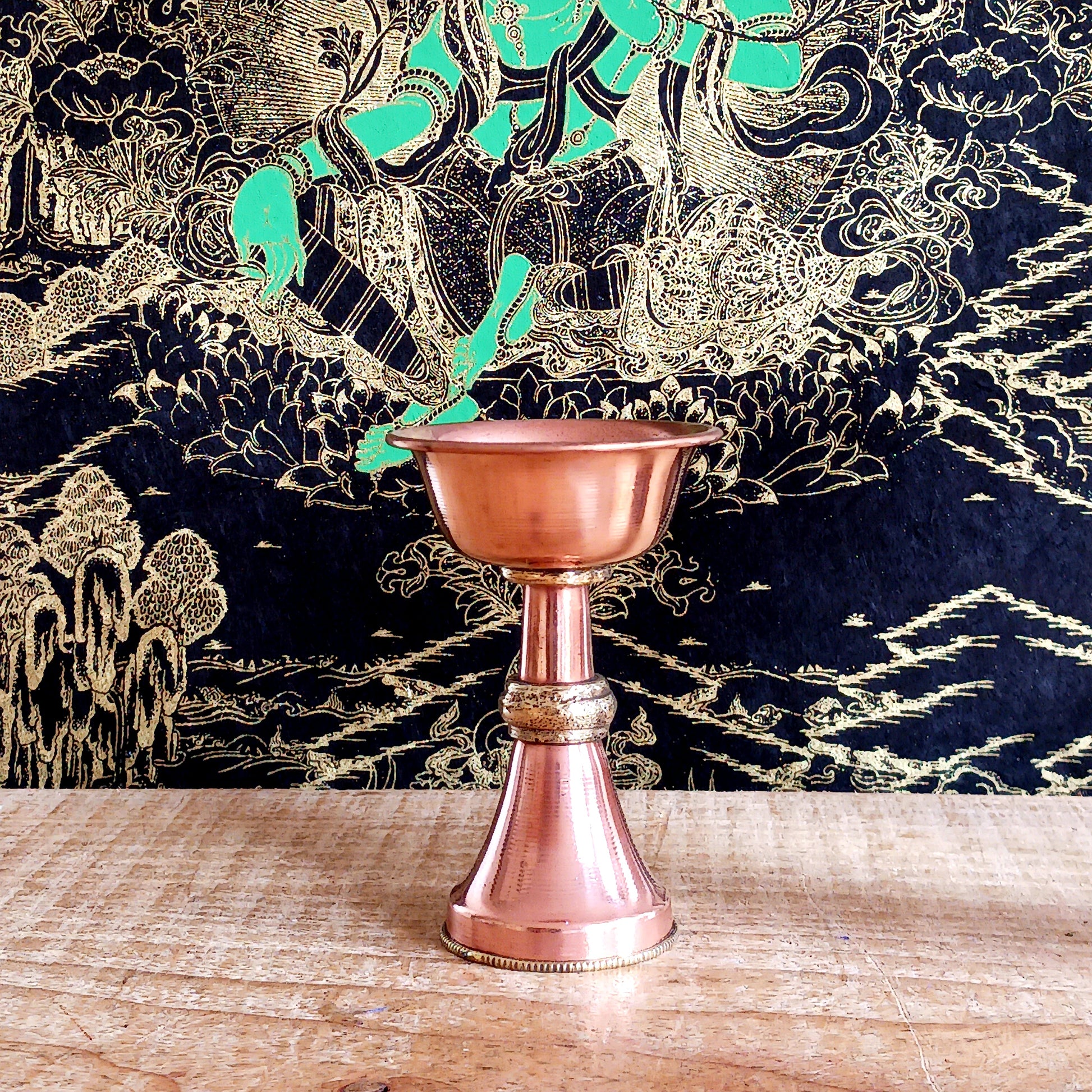 Illuminate your spiritual practice with this fine Traditional Tibetan Butter Lamp, handcrafted from high-quality copper.&nbsp;These sacred lamps are a central element in Tibetan Buddhist rituals, symbolizing the light of wisdom dispelling the darkness of ignorance. Commonly found in Himalayan temples and monasteries, butter lamps are offered each morning by Tibetan Buddhists.