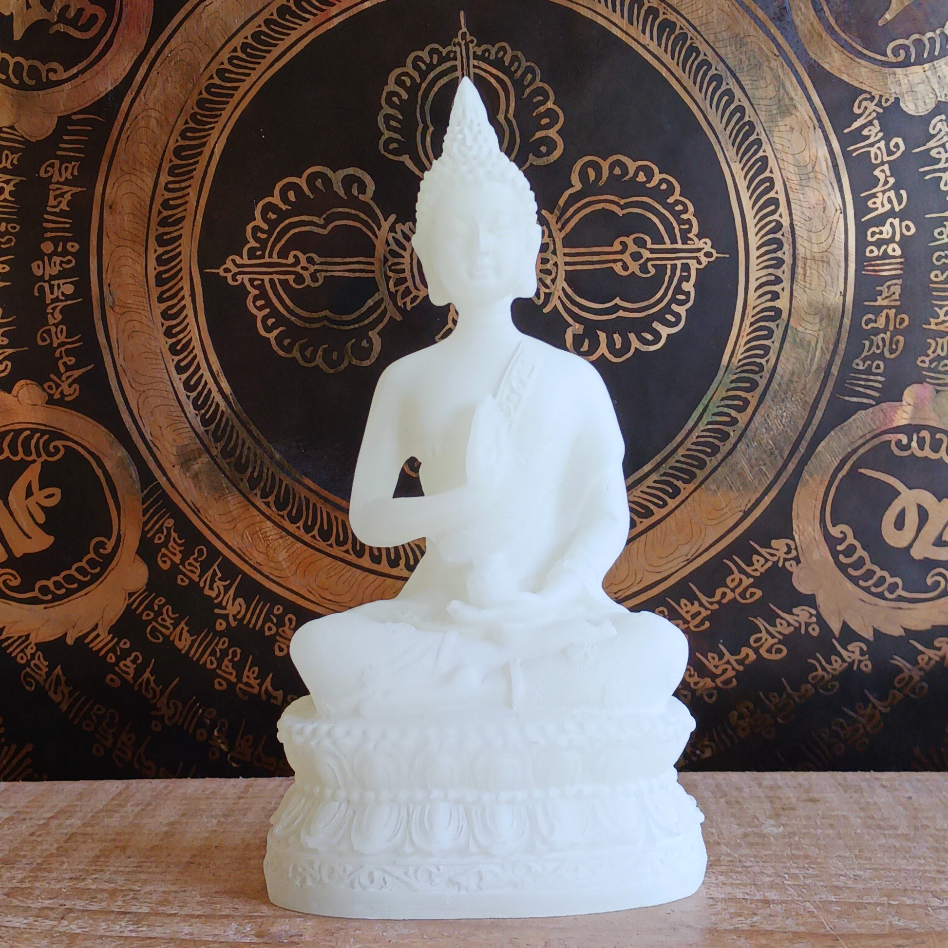 Bring serenity and spiritual symbolism into your sacred space with this beautifully crafted 16cm White Buddha Statue, complete with an Amrita vase. Handmade in Tibet, this statue reflects traditional Buddhist artistry and carries deep meaning rooted in ancient Sanskrit.