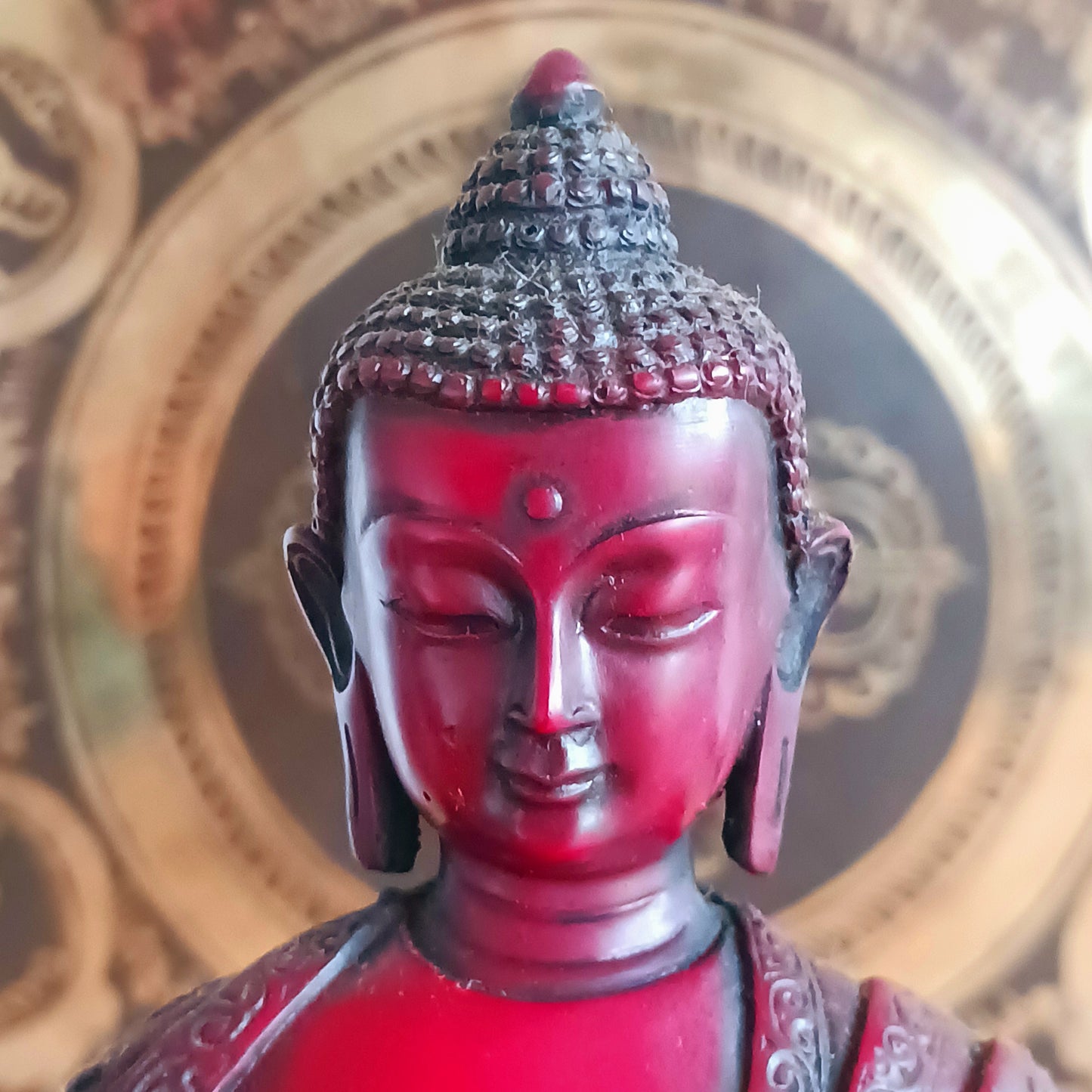 Bring the serene power of healing into your space with this large Medicine Buddha statue. Crafted in a deep, rich red colour with intricate detailing, this sculpture represents Bhaisajya Tathagatta, also known as the Healing Buddha.