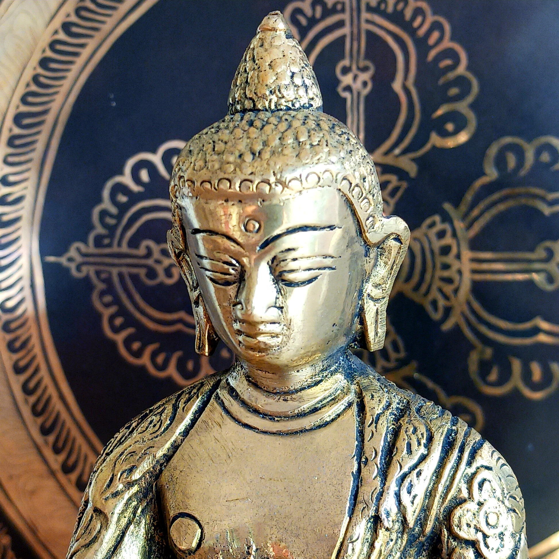 Elevate your spiritual space with this exquisite Akshobya Buddha statue, expertly cast in heavy brass and engraved with intricate detail. Representing one of the five Dhyani Buddhas, Akshobya is visualized in blue and associated with the heart chakra, symbolizing the transformation of anger and sadness into love and compassion.