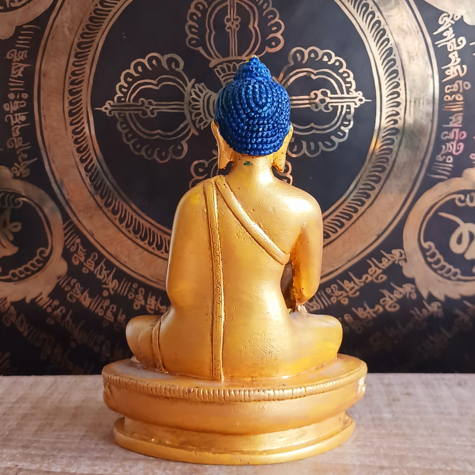Bring serenity and spiritual elegance into your space with this stunning Shakyamuni Buddha statue. Crafted from durable clay and resin, it is meticulously painted in rich gold and traditional thangka colours, following the authentic colour patterns described in ancient texts.