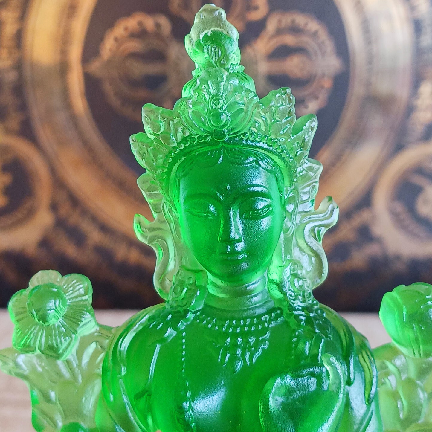 Bring serenity and divine feminine energy into your space with this stunning transparent Green Tara statue, crafted from high-quality glazed glass. Known as the "Mother of all Mothers," Green Tara represents compassion in action. Her graceful posture—one leg extended—symbolizes her readiness to help all beings instantly.