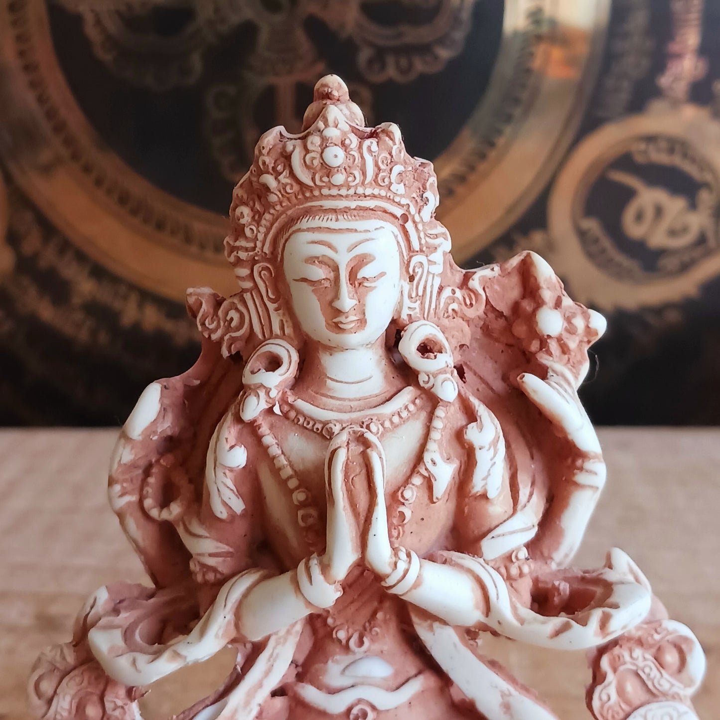Chenrezig (Tibetan) or Avalokiteshvara (Sanskrit) is the Buddha of great compassion, of limitless compassion towards all living beings.  Chenrezig made the strong vow not to return to Nirvana until he had liberated all sentient beings and freed them from suffering.