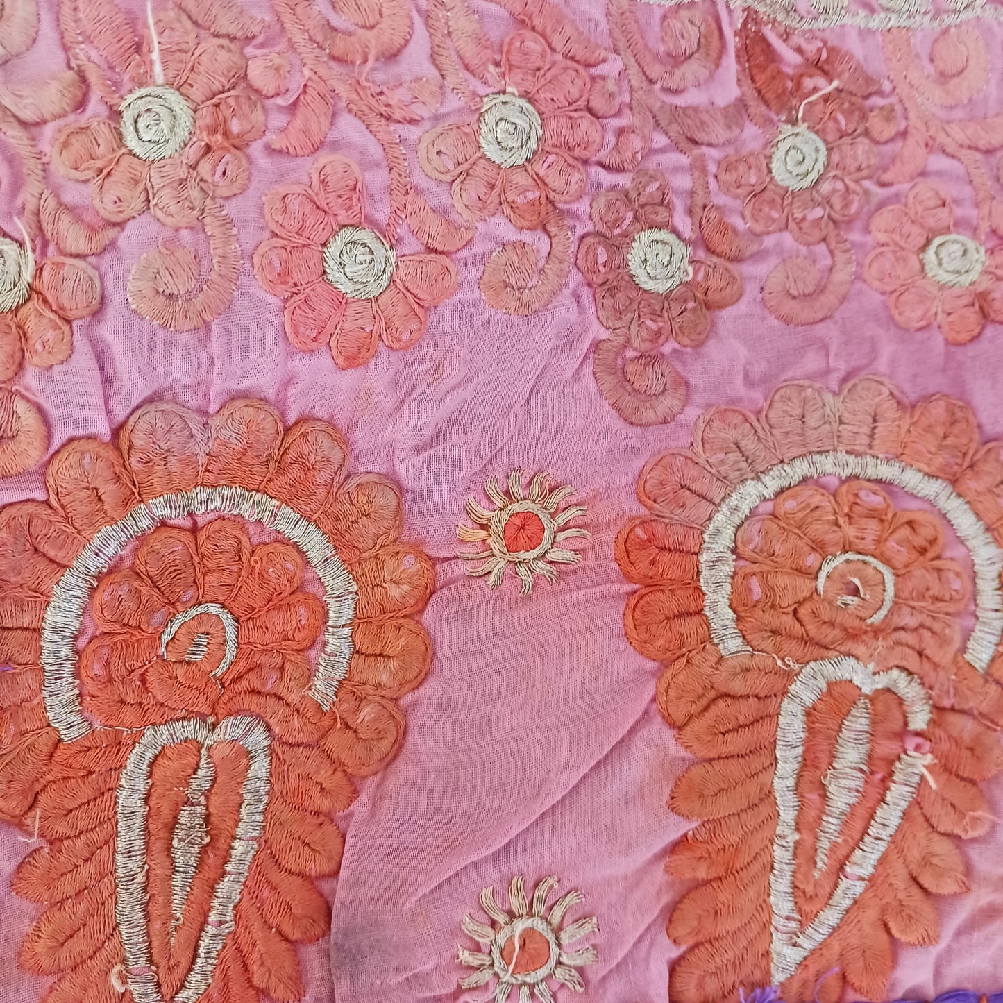 This long and beautifully intricate Indian Toran has been handmade from patches of vintage fabrics, wedding saris and recycled fabrics. It will be a unique addition to any home and bring vibrancy of colour and embellishment.