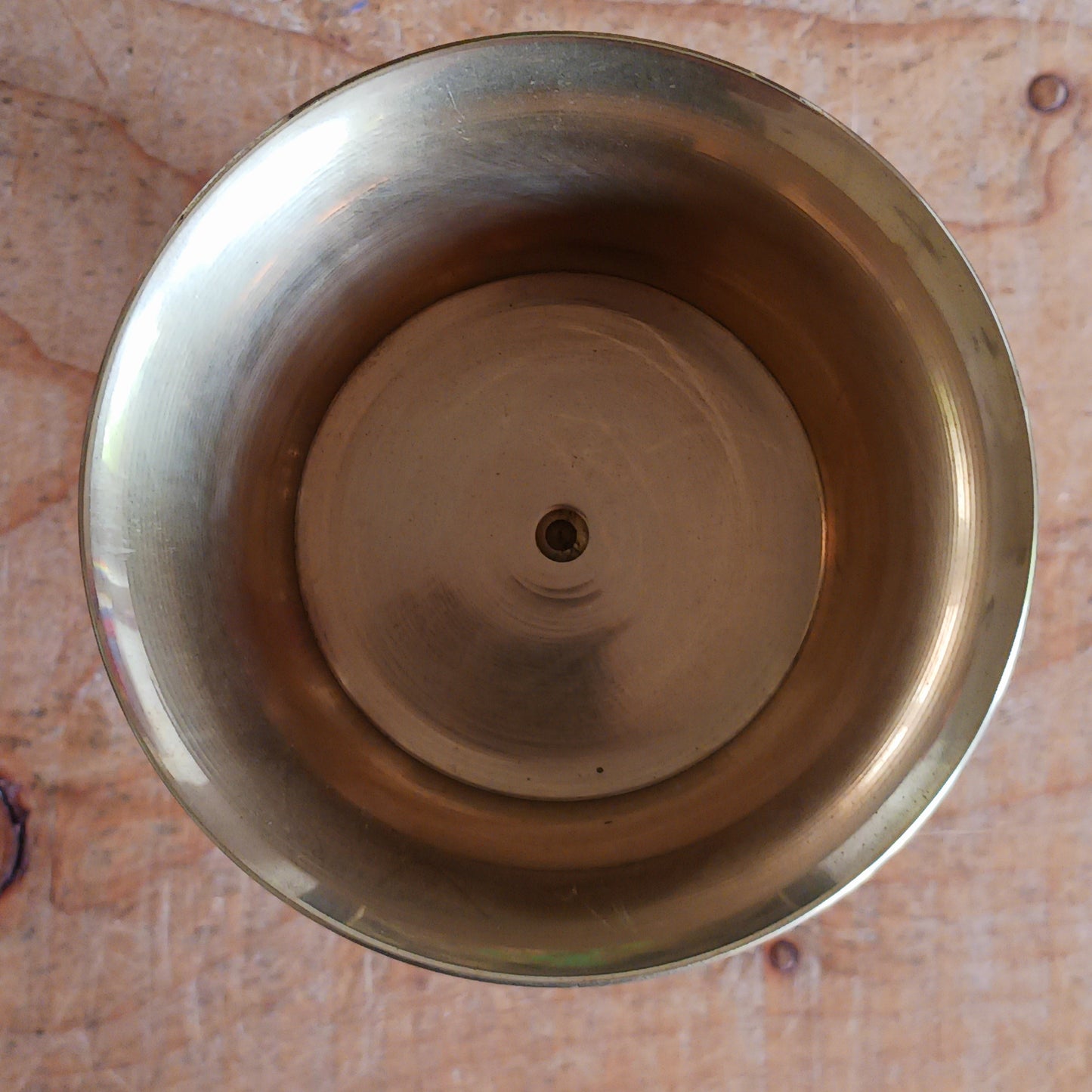 Made from durable brass, the butter lamp emits a warm, soothing glow—ideal for enhancing meditation, prayer, or altar settings. Its two-piece design features a convenient screw mechanism, making it easy to clean and store. A symbol of devotion and cultural heritage, this lamp adds authenticity and serenity to any spiritual practice.