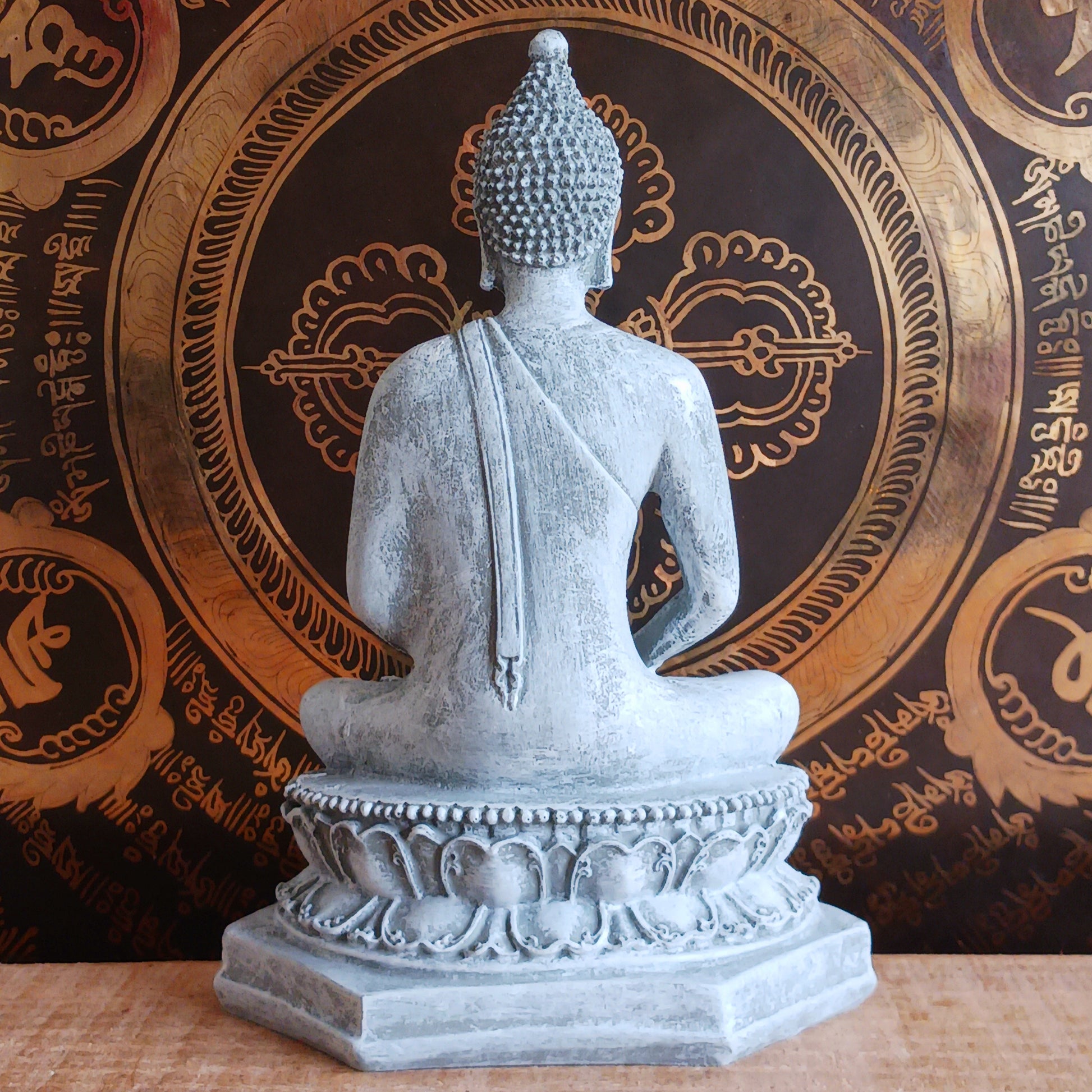 Invite peace and mindfulness into your space with this serene grey Thai-style Buddha statue. Crafted to reflect traditional Thai artistry, this elegant piece features a meditating Buddha seated gracefully on a throne. The calm expression and intricate detailing make it a perfect centerpiece for your home, meditation area, or spiritual altar. Ideal for anyone seeking a touch of tranquility and spiritual inspiration in their décor.