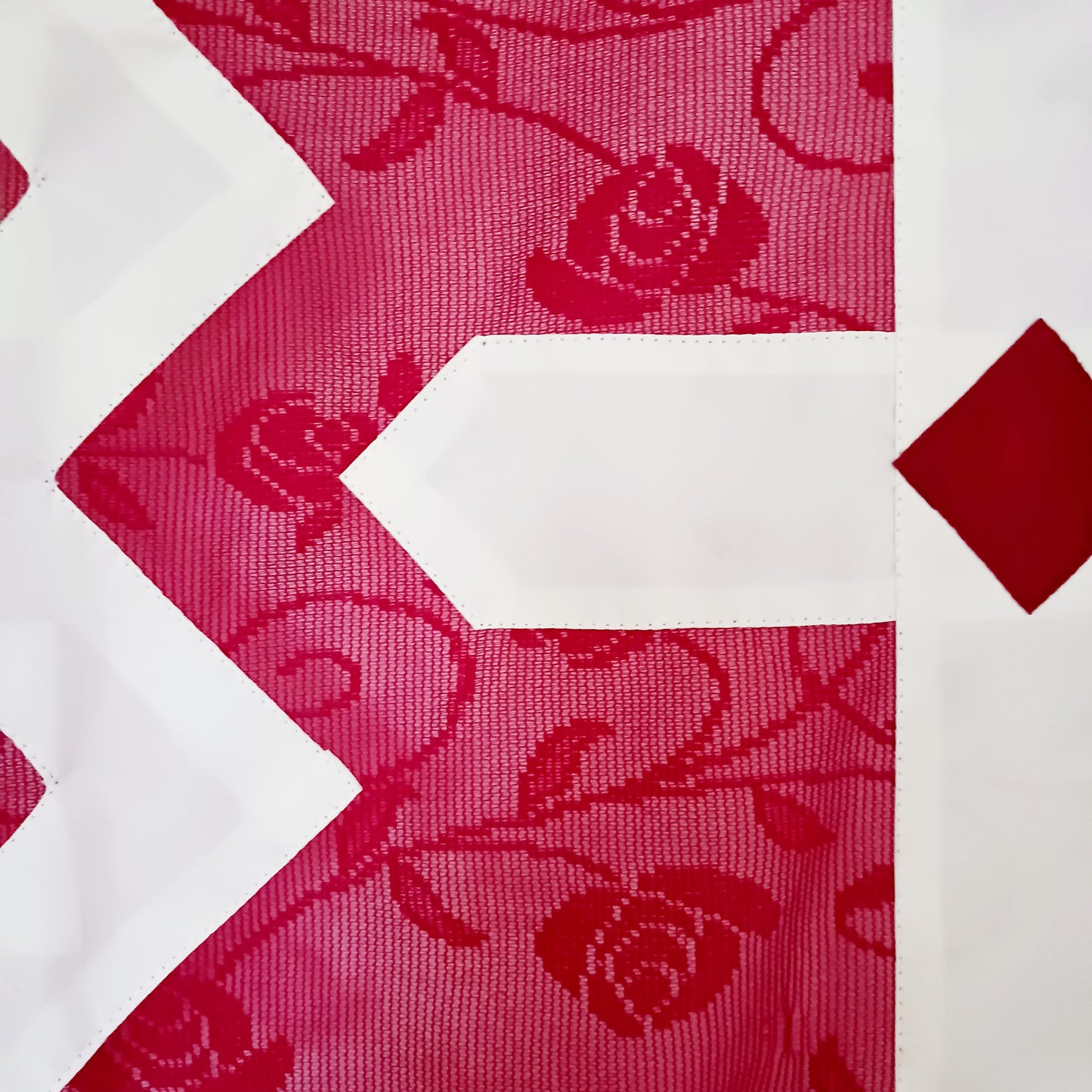 Bring spiritual harmony and traditional Himalayan craftsmanship into your home with this handmade Tibetan Buddhist Endless Knot Door Curtain. Crafted in a rich maroon fabric, this semi-transparent curtain allows natural light to pass through, creating a warm and calming atmosphere.