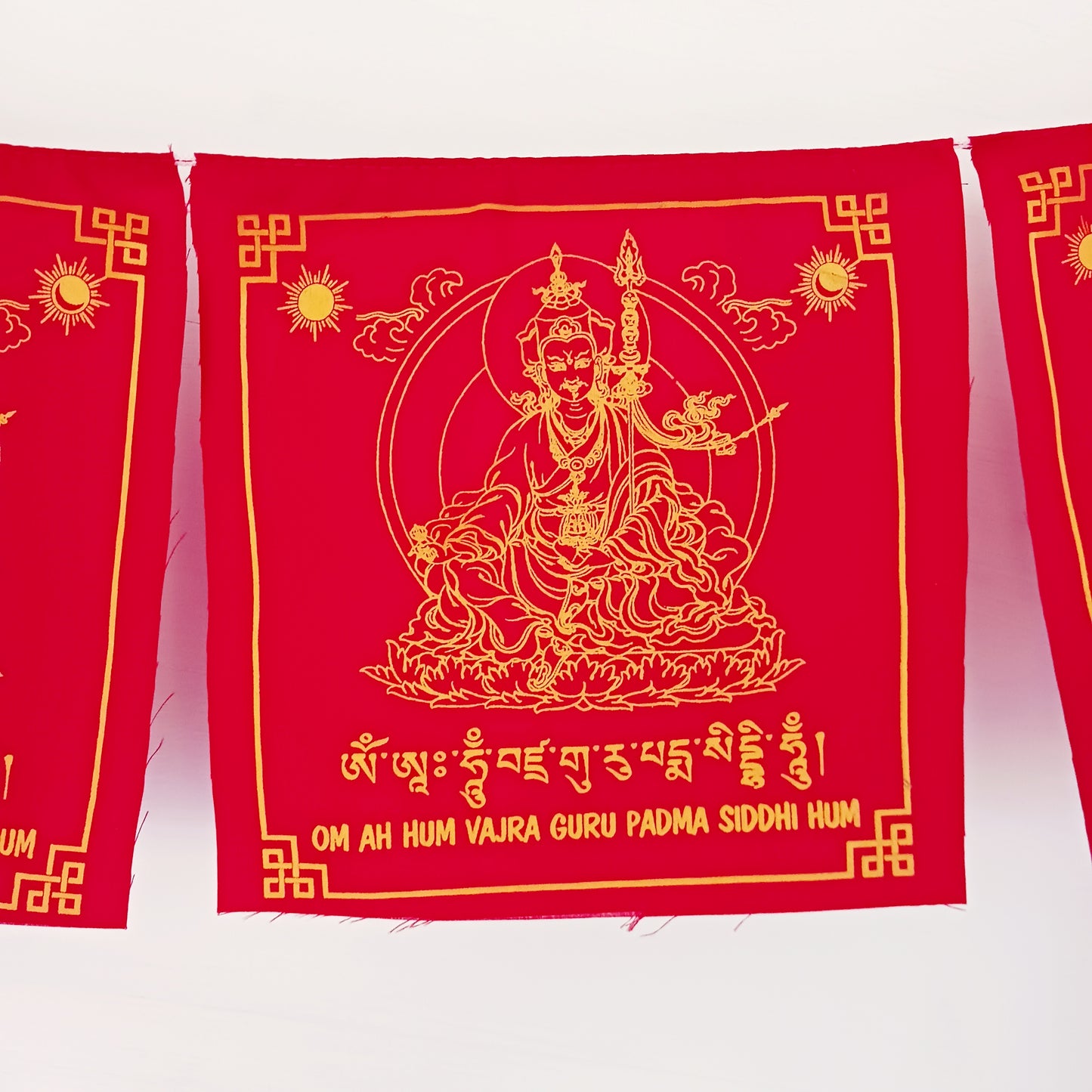 Invite the blessings of Guru Rinpoche, the “Precious Master,” into your home or sacred space with this beautiful set of prayer flags. Known as the founder of Tibetan Buddhism and an emanation of Buddha Amitabha, Guru Rinpoche brought the tantric teachings to Tibet in the 8th century, guiding countless beings on the path to enlightenment.