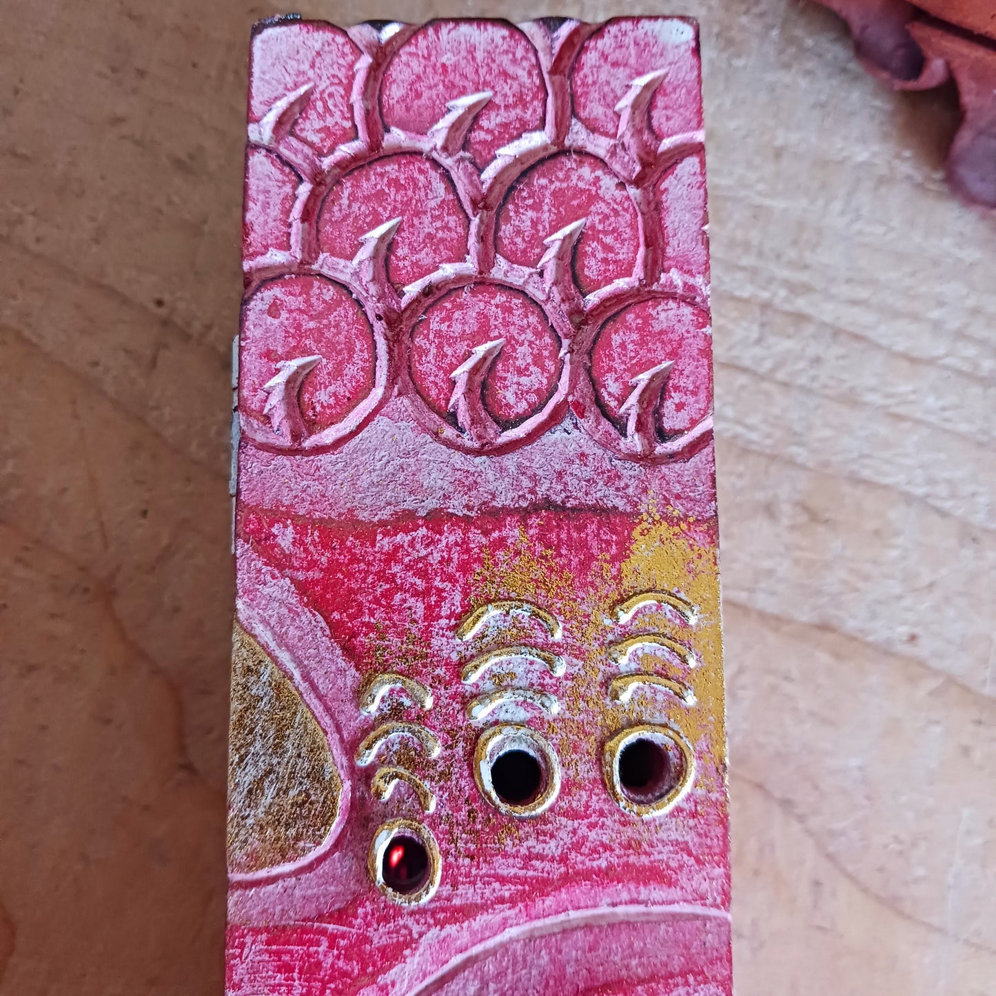 Create a calm, aromatic atmosphere in your home with this beautifully handcrafted Buddha incense holder. Made from responsibly sourced wood, this unique piece features a delicately hand-carved Buddha head, making it both a functional incense burner and a decorative spiritual accent.