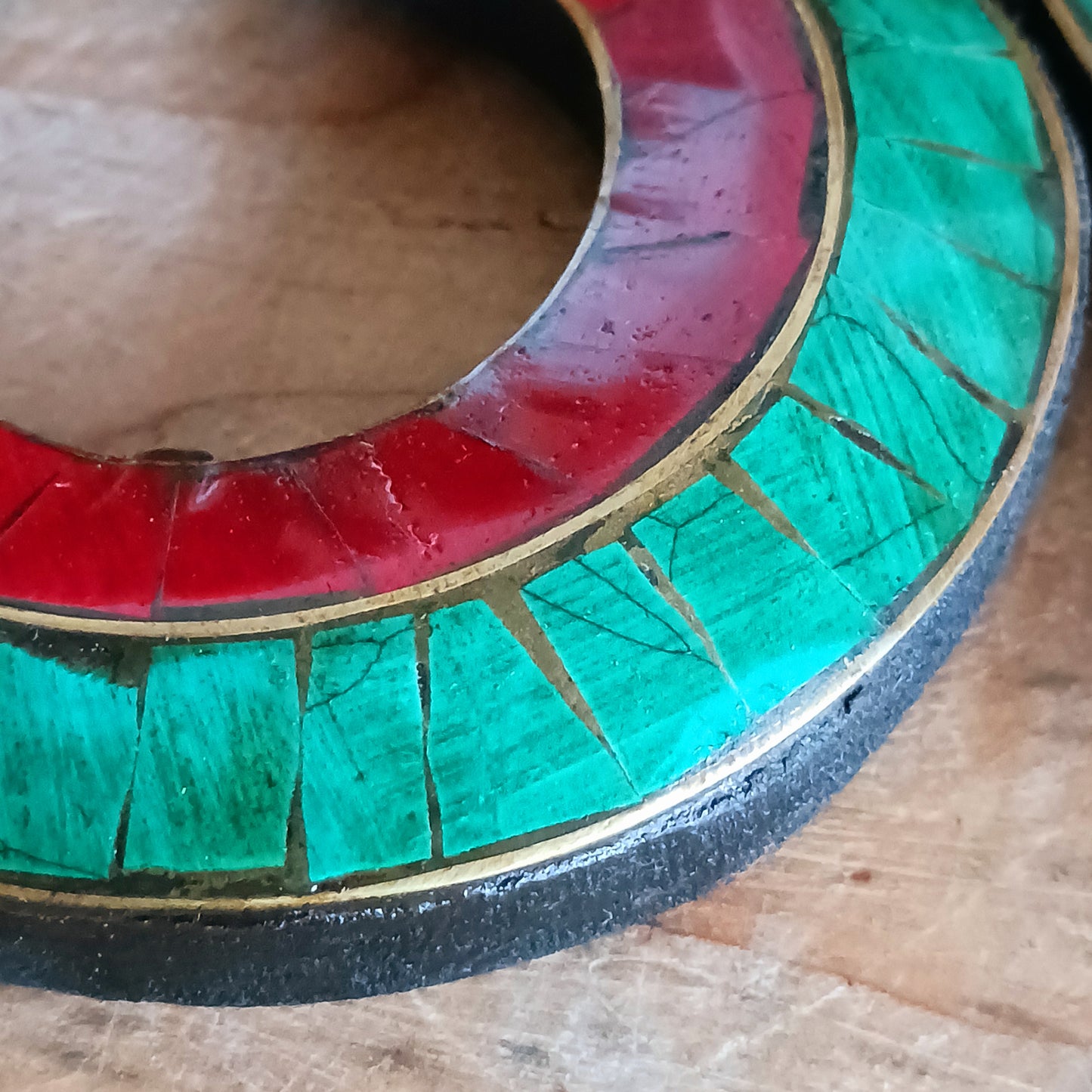 Bring harmony, artistry, and spiritual presence into your space with this handmade wooden Tibetan OM sign, inspired by the first character of the sacred mantra “Om Mani Padme Hum.”