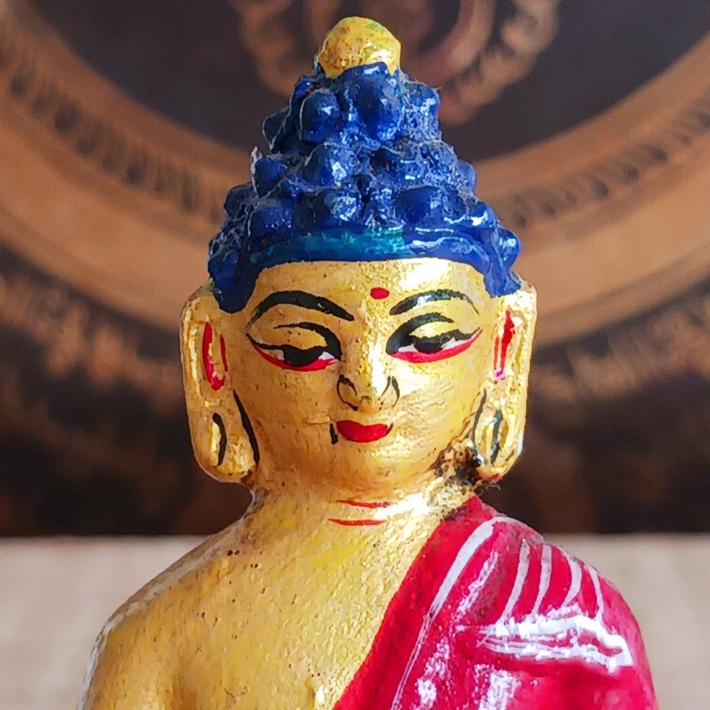 The Medicine Buddha is revered for his power to heal physical and emotional ailments. He is depicted in serene meditation, holding a bowl of healing medicine, making this statue a meaningful addition to any altar, meditation corner, or sacred space.