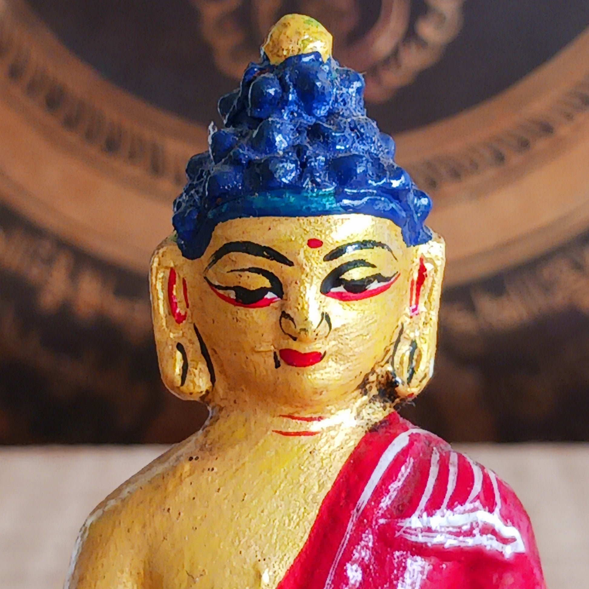 The Medicine Buddha is revered for his power to heal physical and emotional ailments. He is depicted in serene meditation, holding a bowl of healing medicine, making this statue a meaningful addition to any altar, meditation corner, or sacred space.