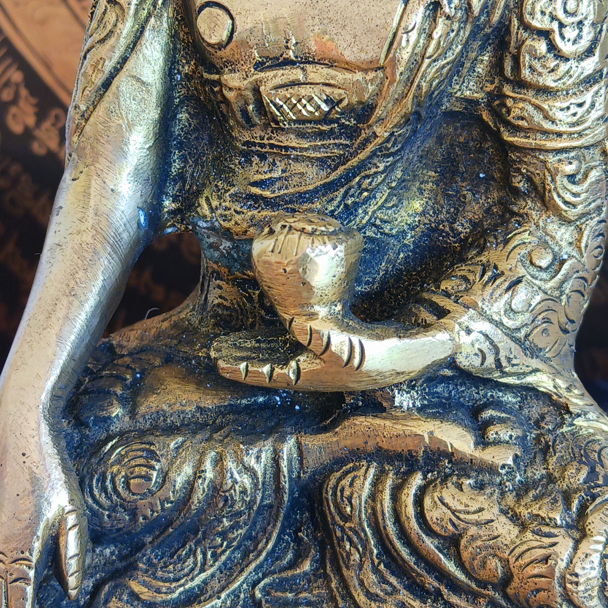 Elevate your spiritual space with this exquisite Akshobya Buddha statue, expertly cast in heavy brass and engraved with intricate detail. Representing one of the five Dhyani Buddhas, Akshobya is visualized in blue and associated with the heart chakra, symbolizing the transformation of anger and sadness into love and compassion.