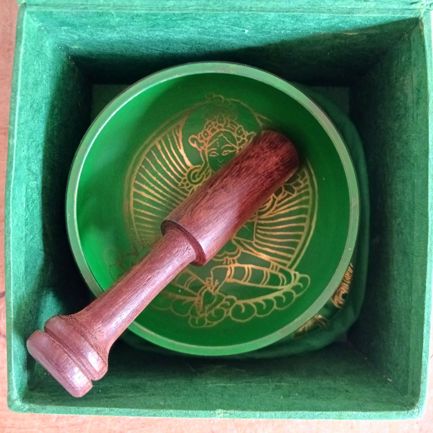 Hand-painted Green Tara singing bowl set with striker & pillow. A sacred gift for meditation, mindfulness, or yoga. Comes in eco-friendly packaging.