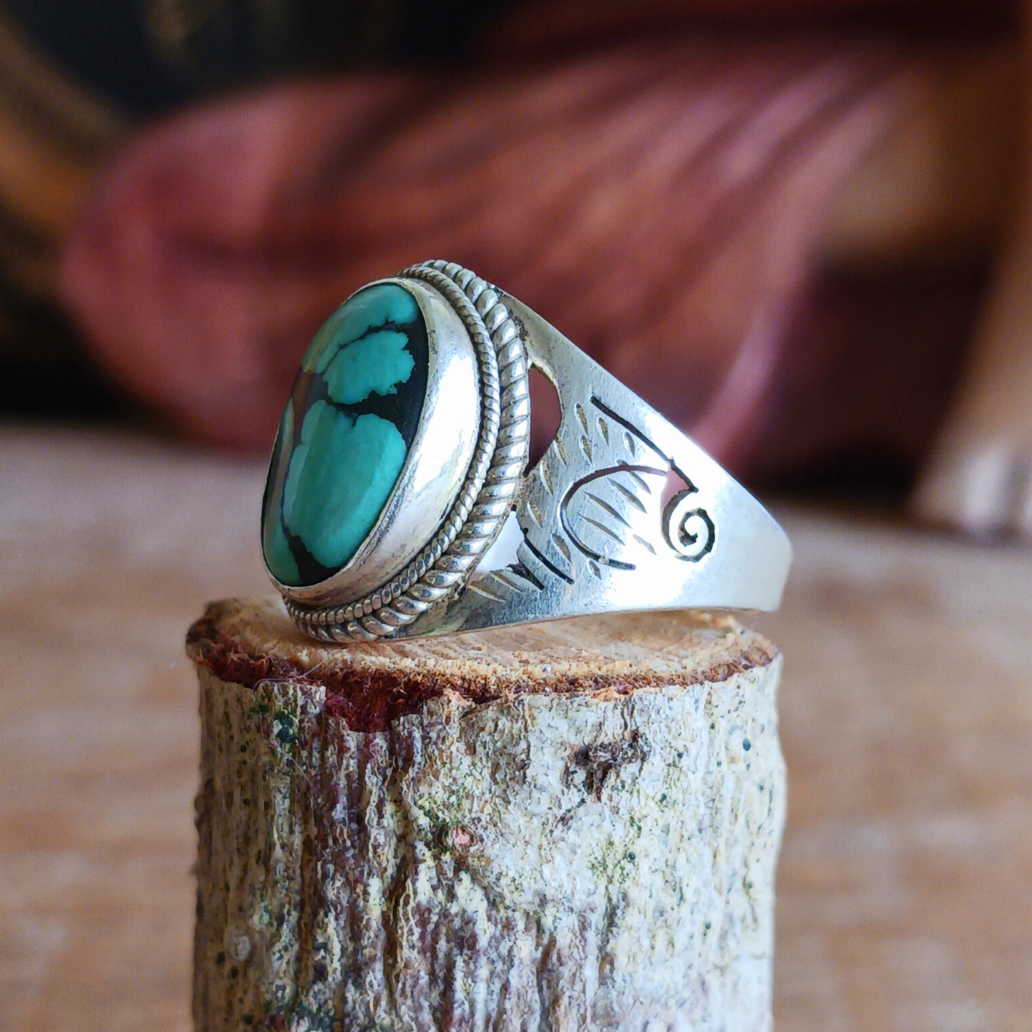This beautiful decorative Tibetan turquoise ring is carefully handcrafted with genuine Sterling Silver 925, featuring an intricate surround design that highlights the natural beauty of the stone.