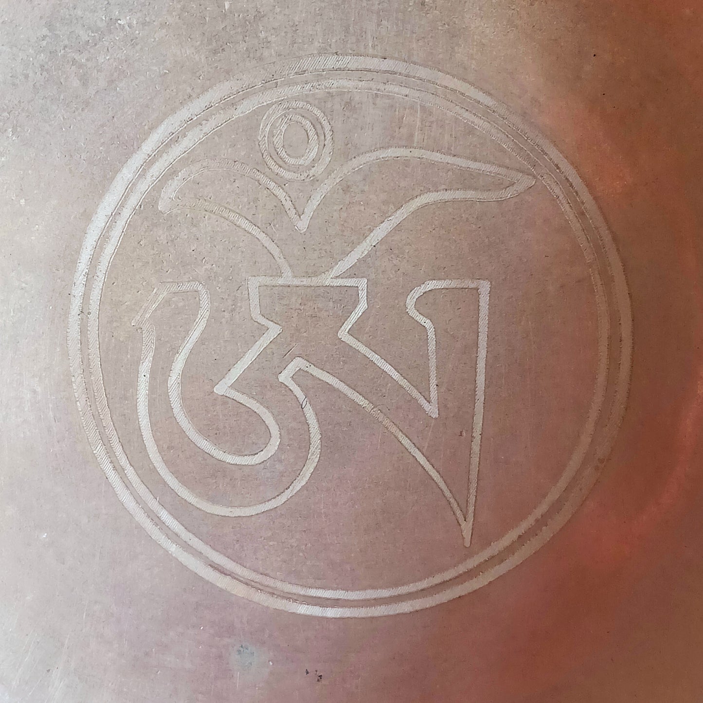 Elevate your meditation and sound healing practice with this Classic Hand-Hammered Singing Bowl, beautifully engraved with the sacred OHM symbol inside the bowl. This is a unique, one-of-a-kind item—you will receive exactly the bowl pictured.