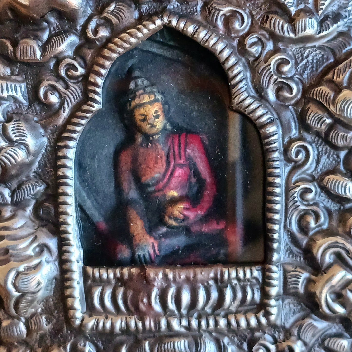 Discover the spiritual power of the Tibetan Ghau, a portable shrine and traditional prayer box used to carry sacred relics, charms, and medicinal herbs. Crafted by skilled Tibetan refugee artisans in Nepal, each Ghau serves as a portable shrine offering protection and blessings during travel. Wear it as a pendant around your neck or hang it from a waist sash or belt. This handcrafted piece is not only a spiritual talisman but also a beautiful work of art, connecting you to centuries-old Tibetan traditions.